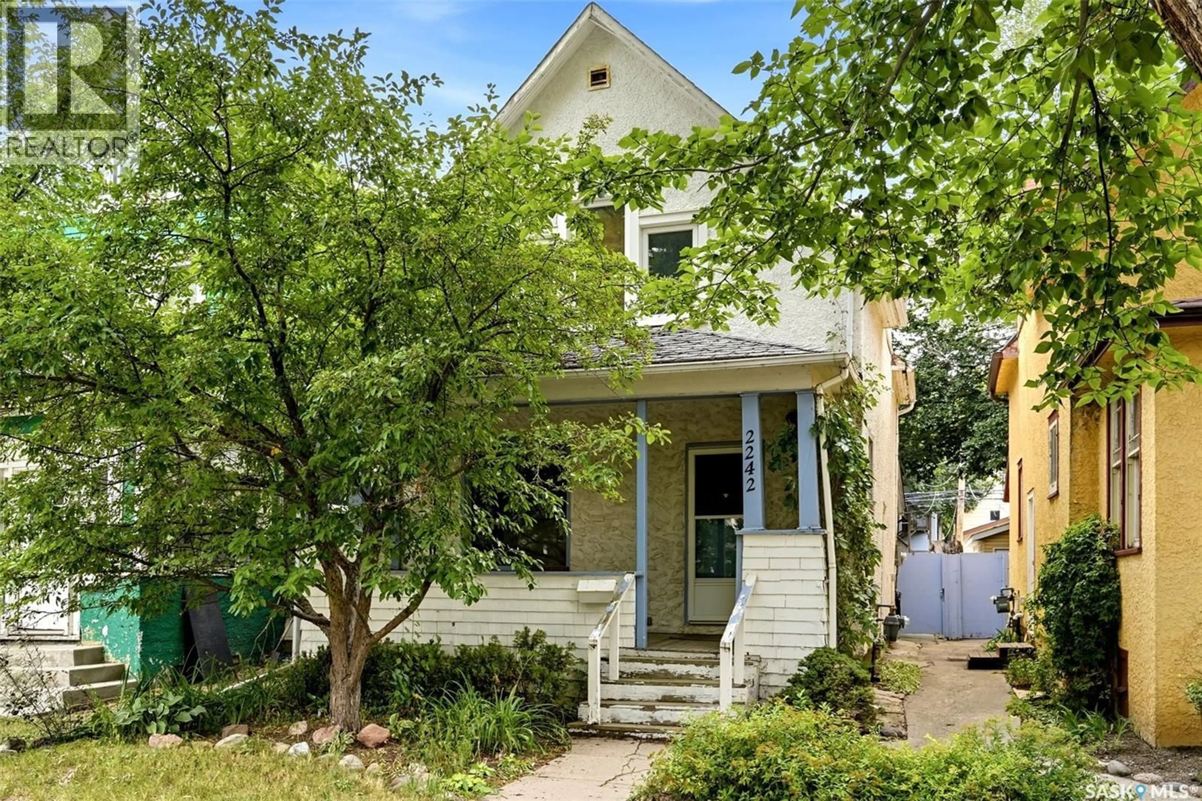 Home with vinyl exterior material, street for 2242 ANGUS STREET, Regina Saskatchewan S4T2A2