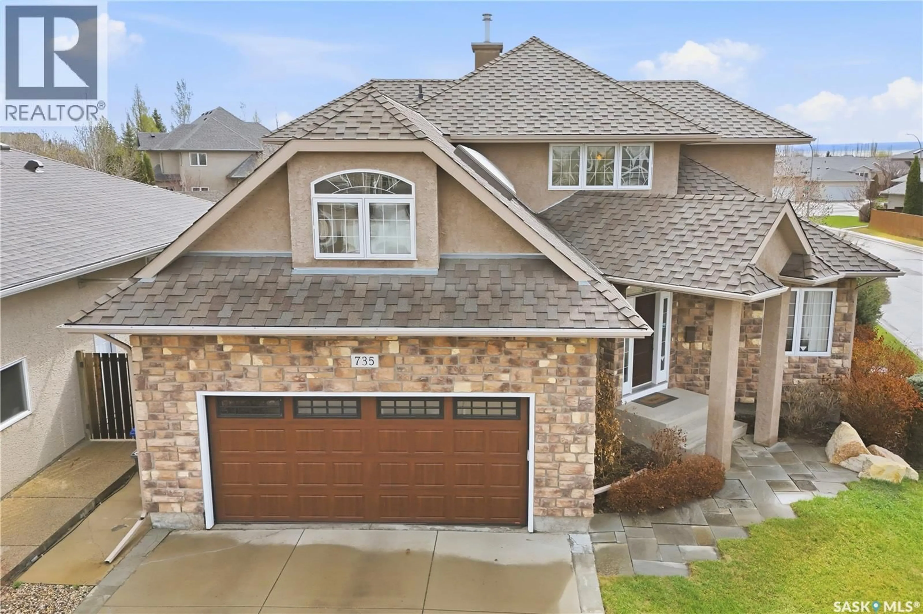 Home with brick exterior material, street for 735 WRIGHT CRESCENT, Saskatoon Saskatchewan S7N4T8