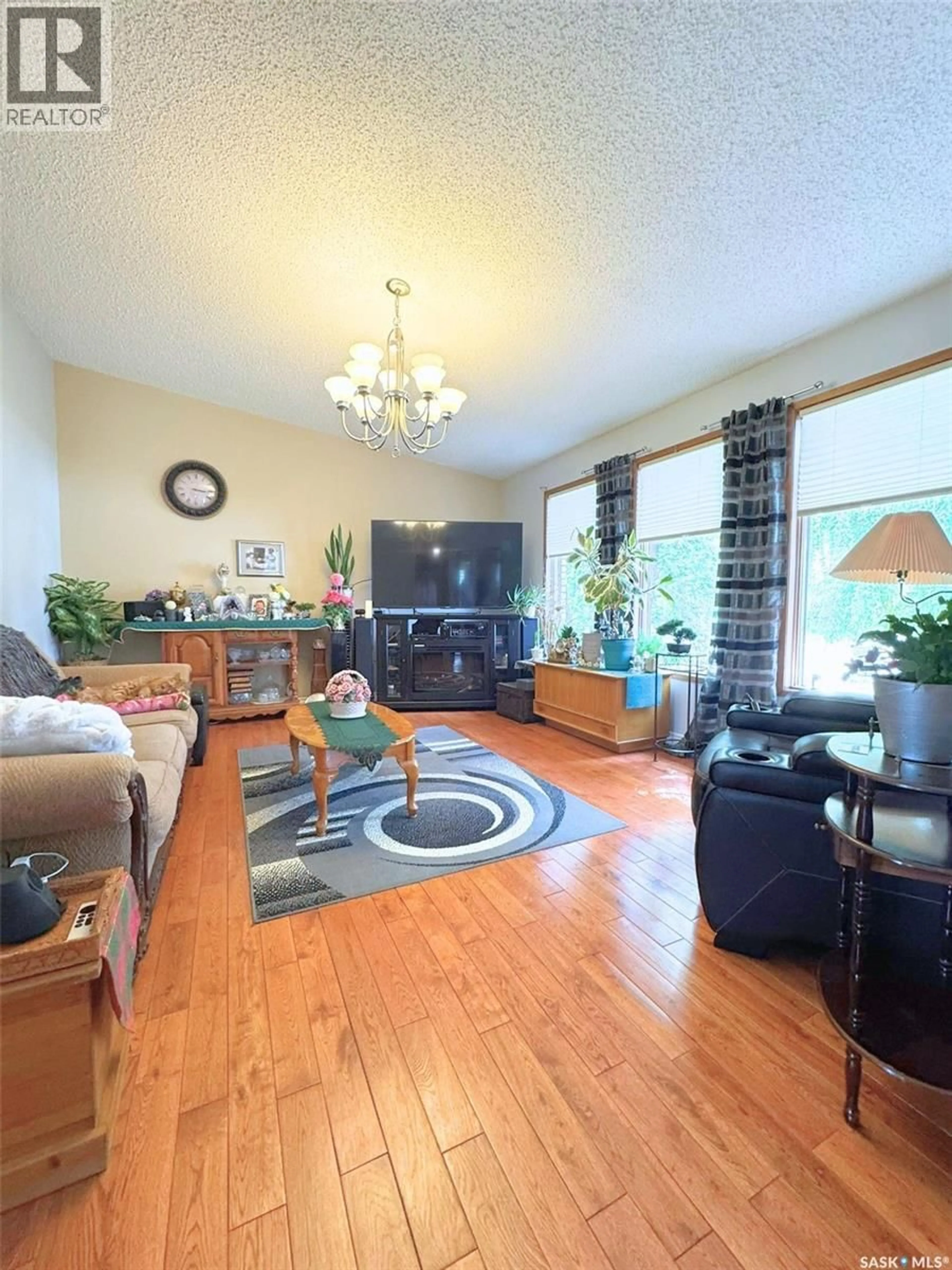 Living room with furniture, wood/laminate floor for 41 BIGGS CRESCENT, Yorkton Saskatchewan S3N3Y8