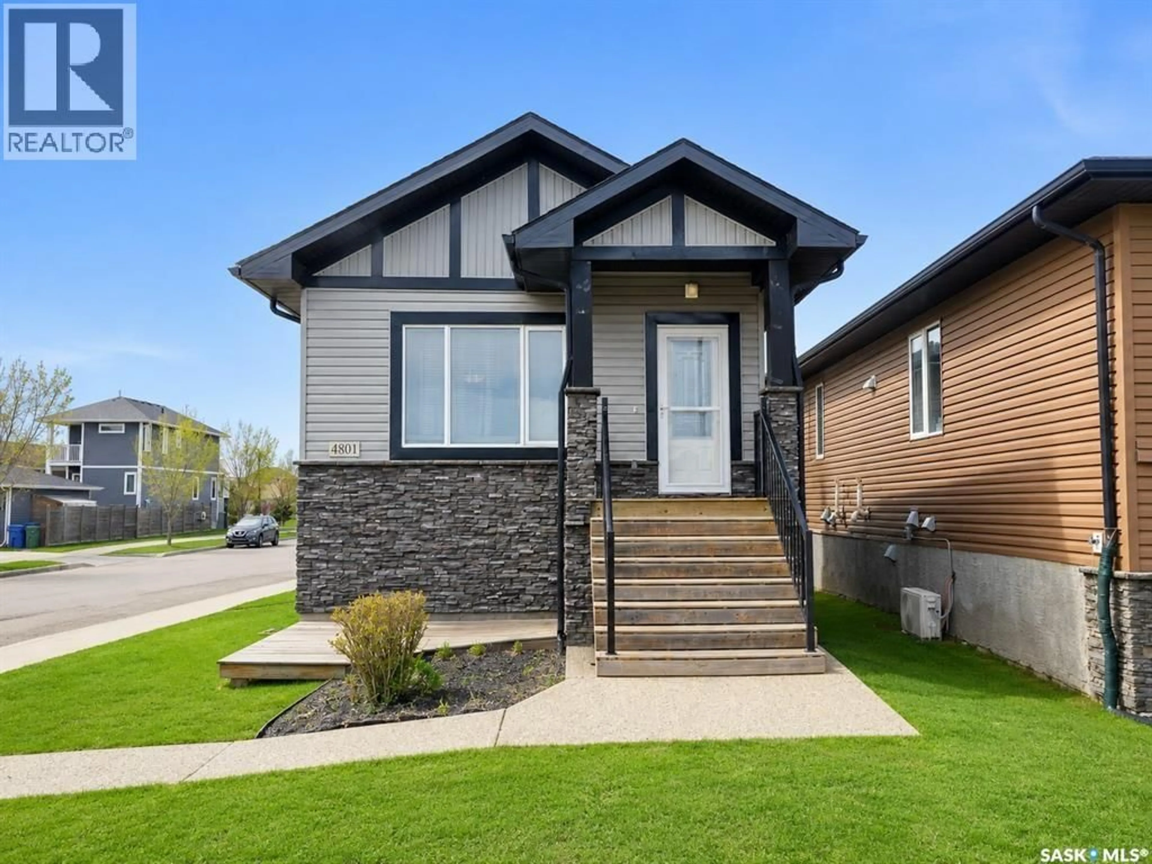 Home with brick exterior material, street for 4801 JAMES HILL ROAD, Regina Saskatchewan S4W0C6