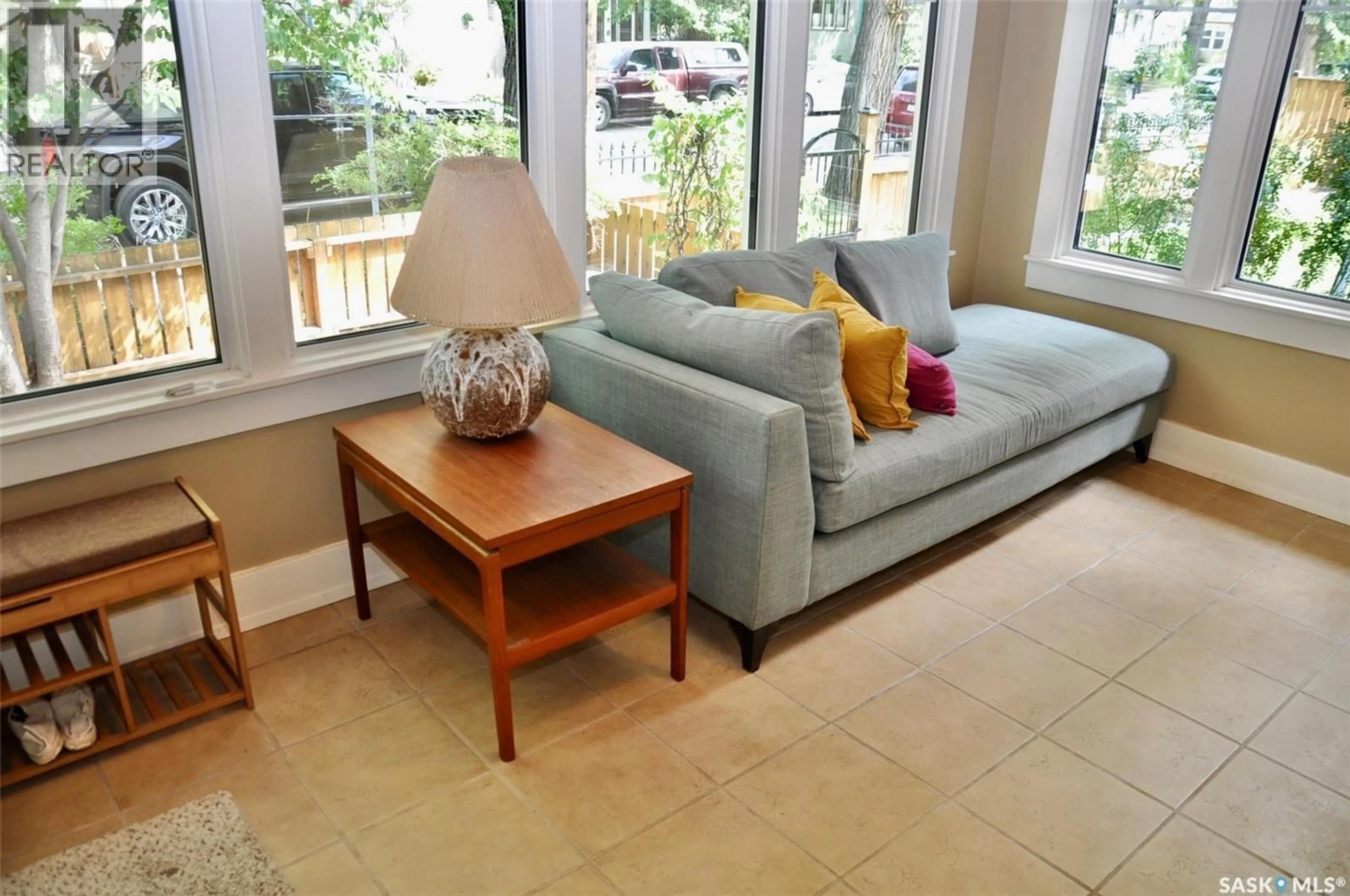 Living room with furniture, ceramic/tile floor for 623 4TH AVENUE, Saskatoon Saskatchewan S7K2M8