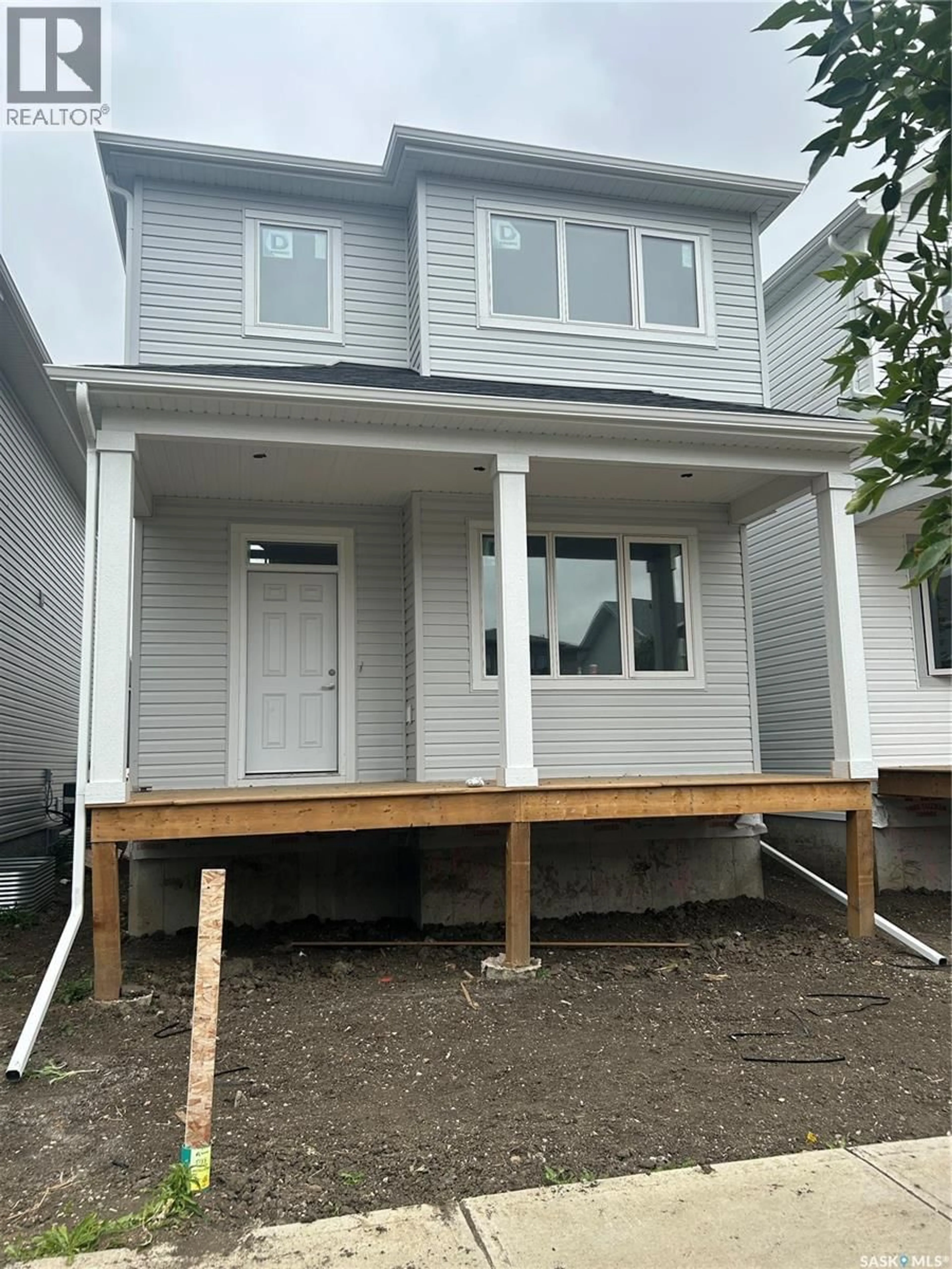 Home with vinyl exterior material, street for 5133 BUCKINGHAM DRIVE, Regina Saskatchewan S4V3S3