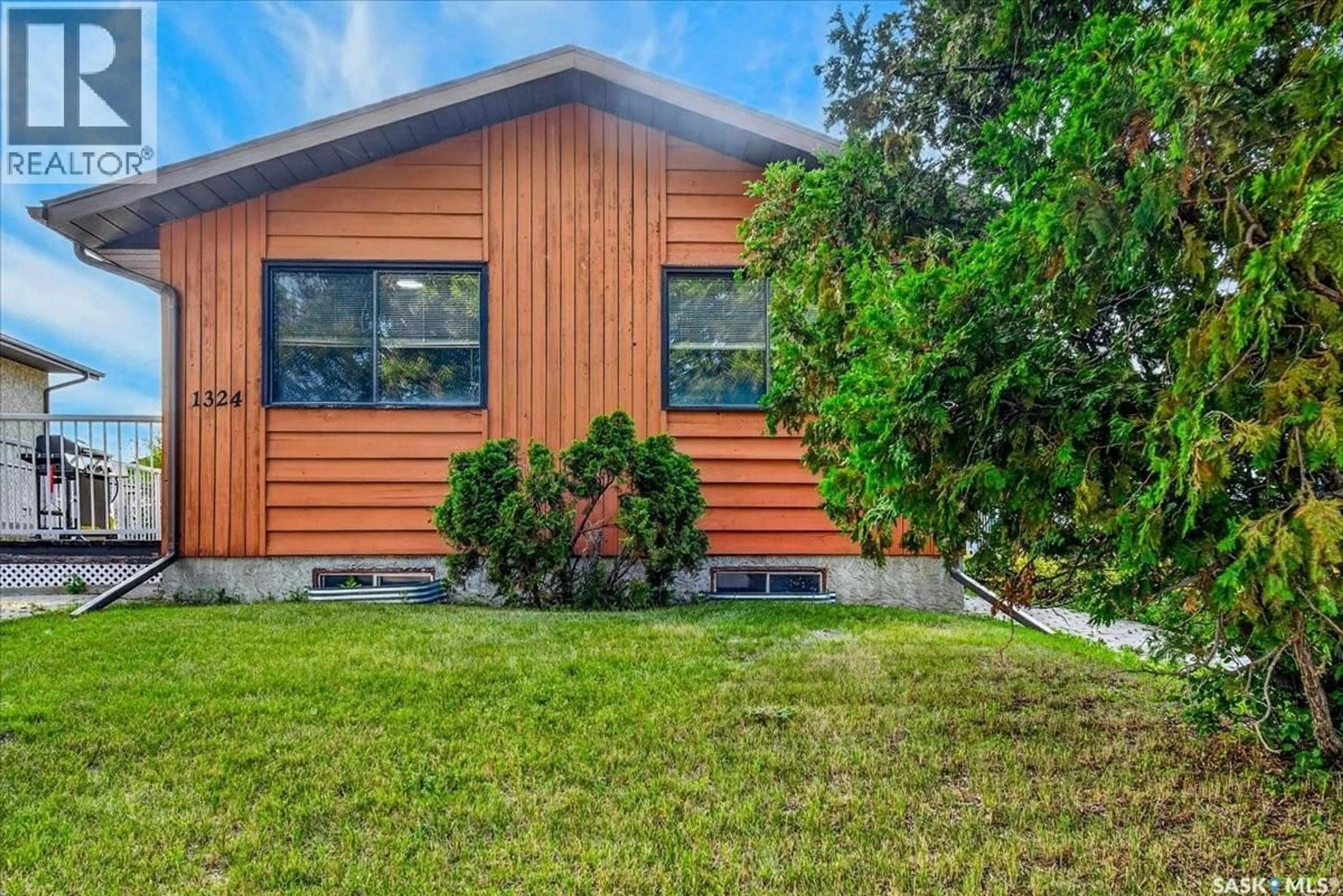 Home with vinyl exterior material, street for 1324 COURTNEY STREET, Regina Saskatchewan S4T7S1