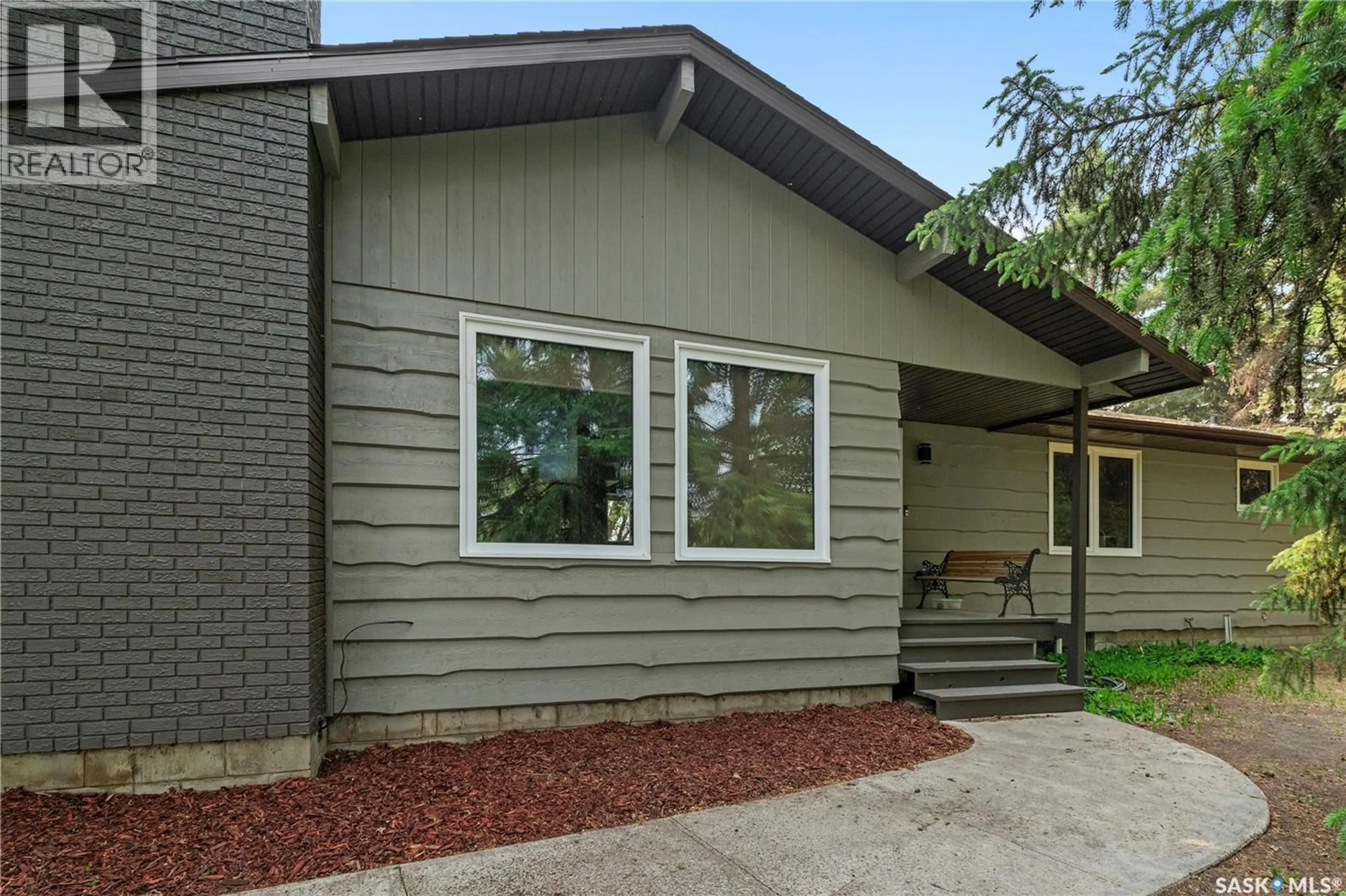 Home with vinyl exterior material, street for 706 2ND AVENUE, Borden Saskatchewan S0K0N0