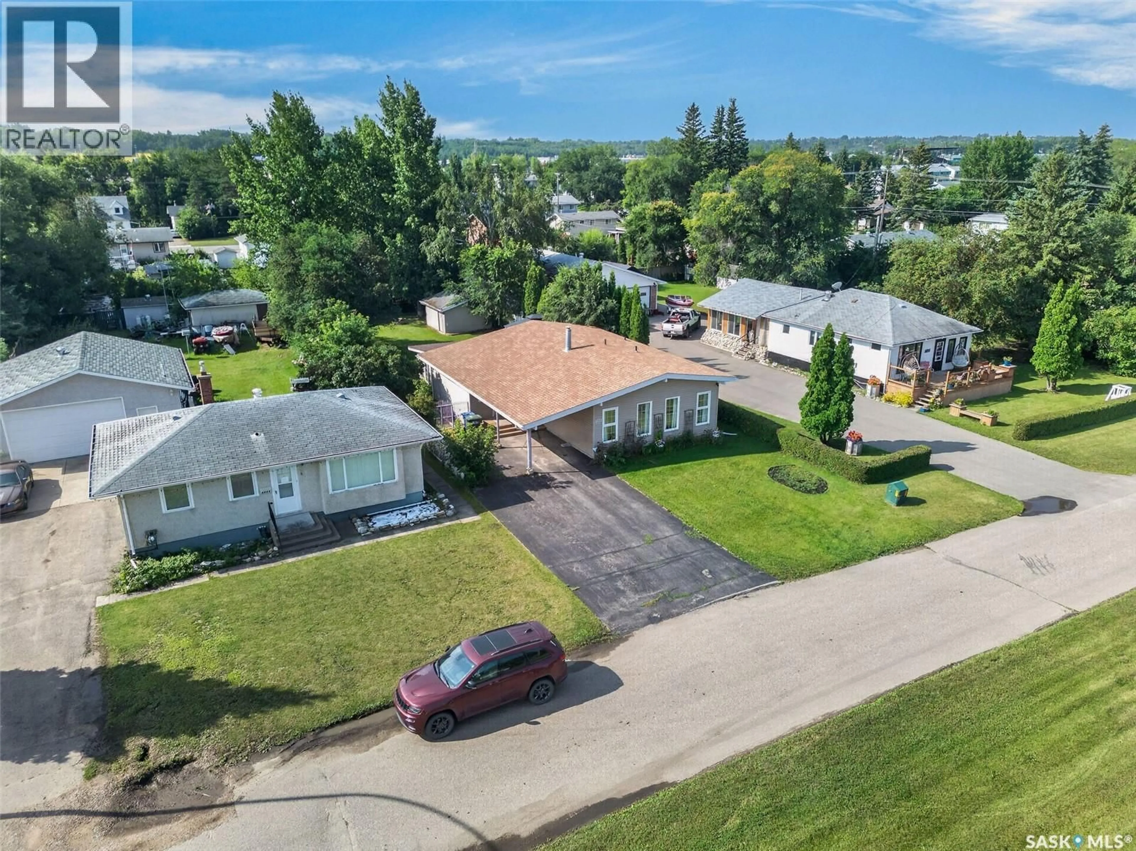 A pic from outside/outdoor area/front of a property/back of a property/a pic from drone, street for 1131 6TH STREET, Prince Albert Saskatchewan S6V0P8