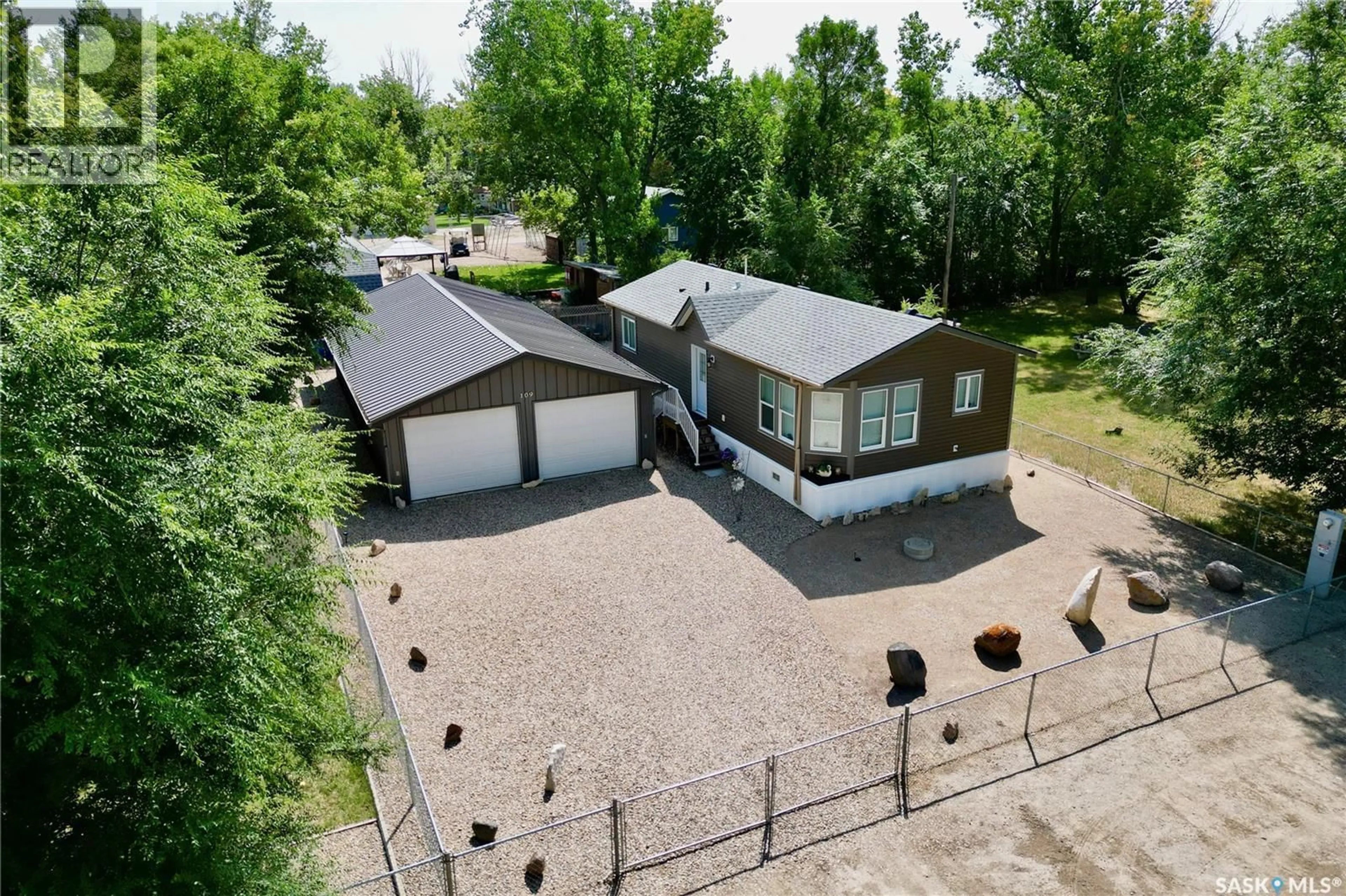 A pic from outside/outdoor area/front of a property/back of a property/a pic from drone, street for 109 LAKEVIEW DRIVE, Island View Saskatchewan S0G4V0