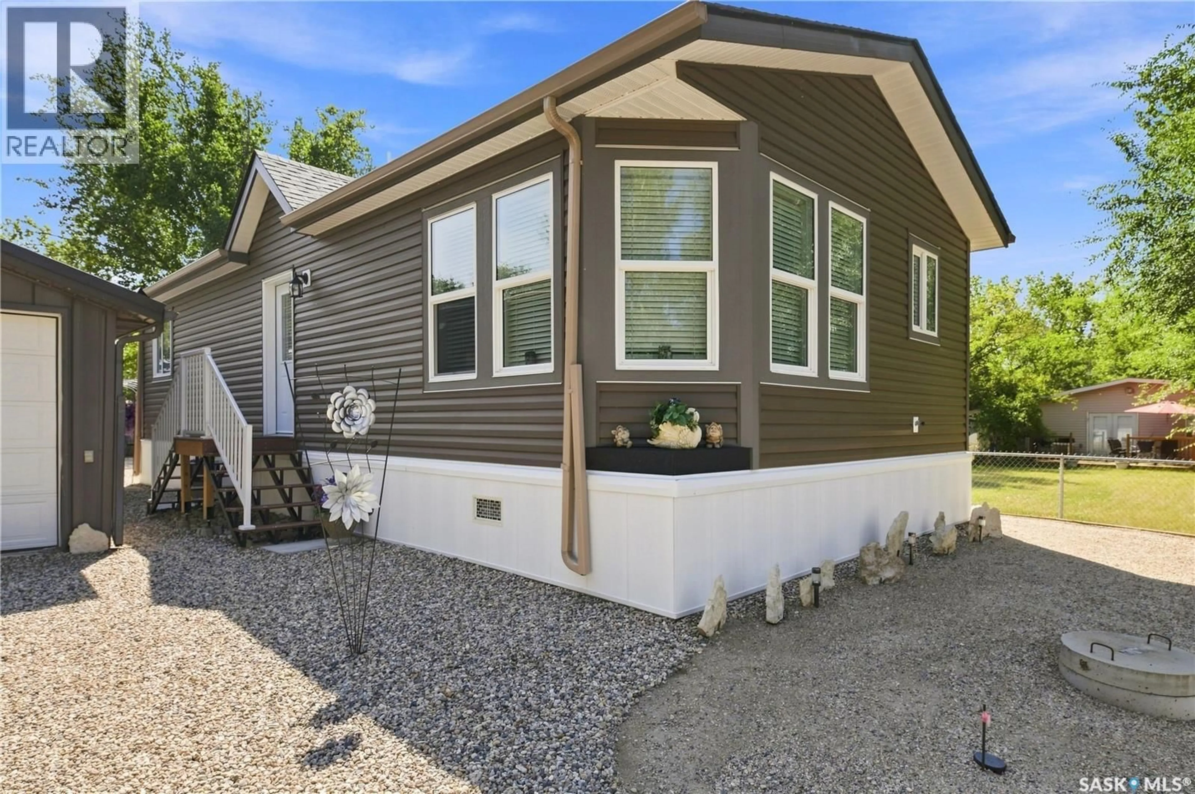Home with vinyl exterior material, street for 109 LAKEVIEW DRIVE, Island View Saskatchewan S0G4V0