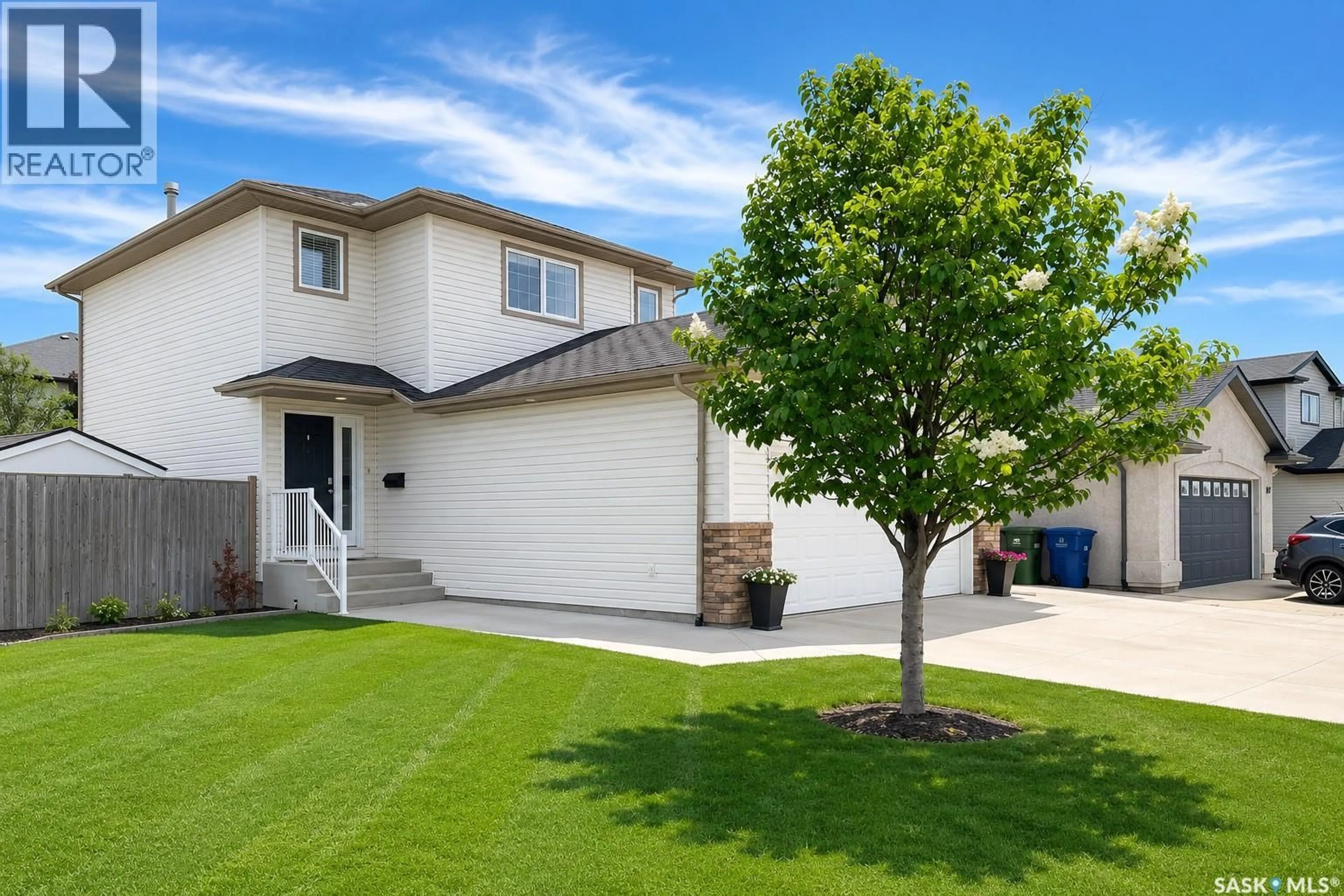 Home with vinyl exterior material, street for 338 STENSRUD ROAD, Saskatoon Saskatchewan S7W1B4