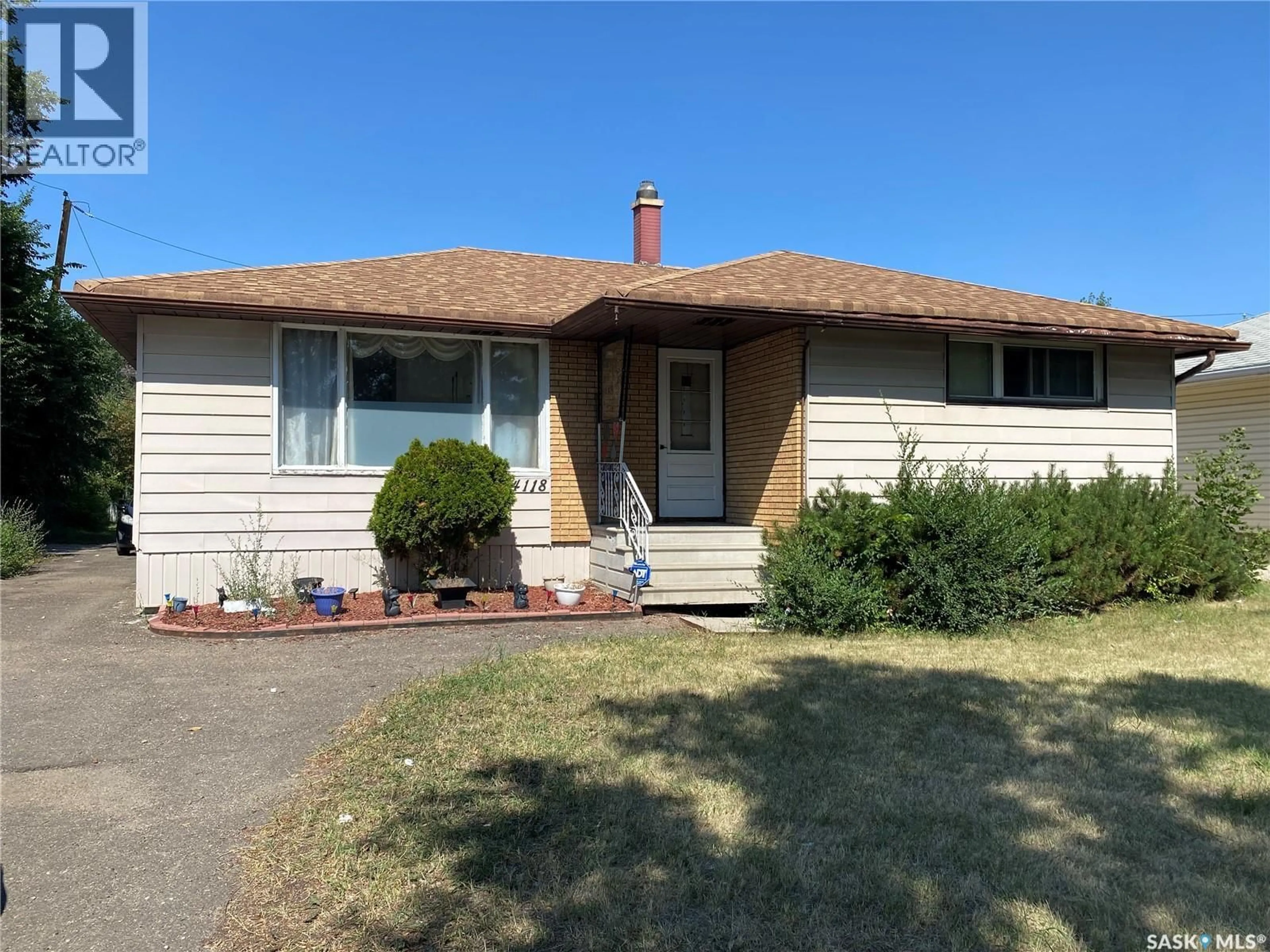 Home with vinyl exterior material, street for 4118 SHERWOOD DRIVE, Regina Saskatchewan S4R4B1