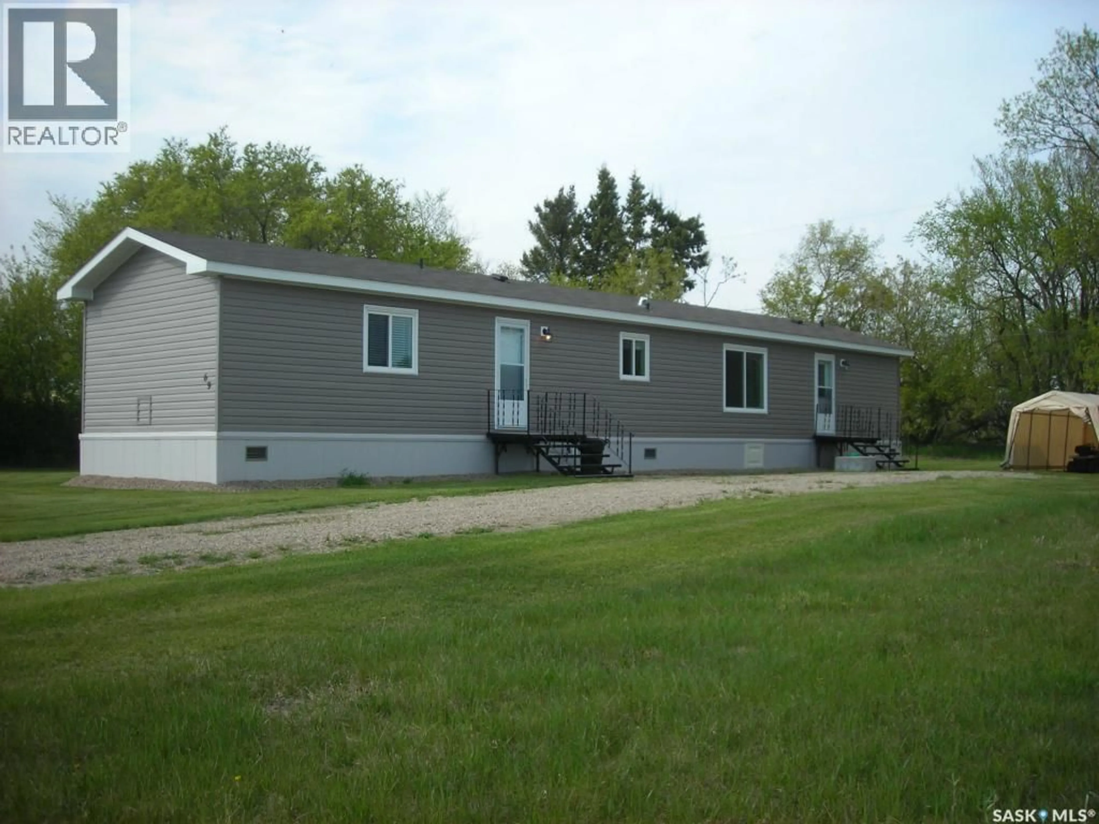 Home with vinyl exterior material, building for 69 RAILWAY AVENUE, Calder Saskatchewan S0A4C0