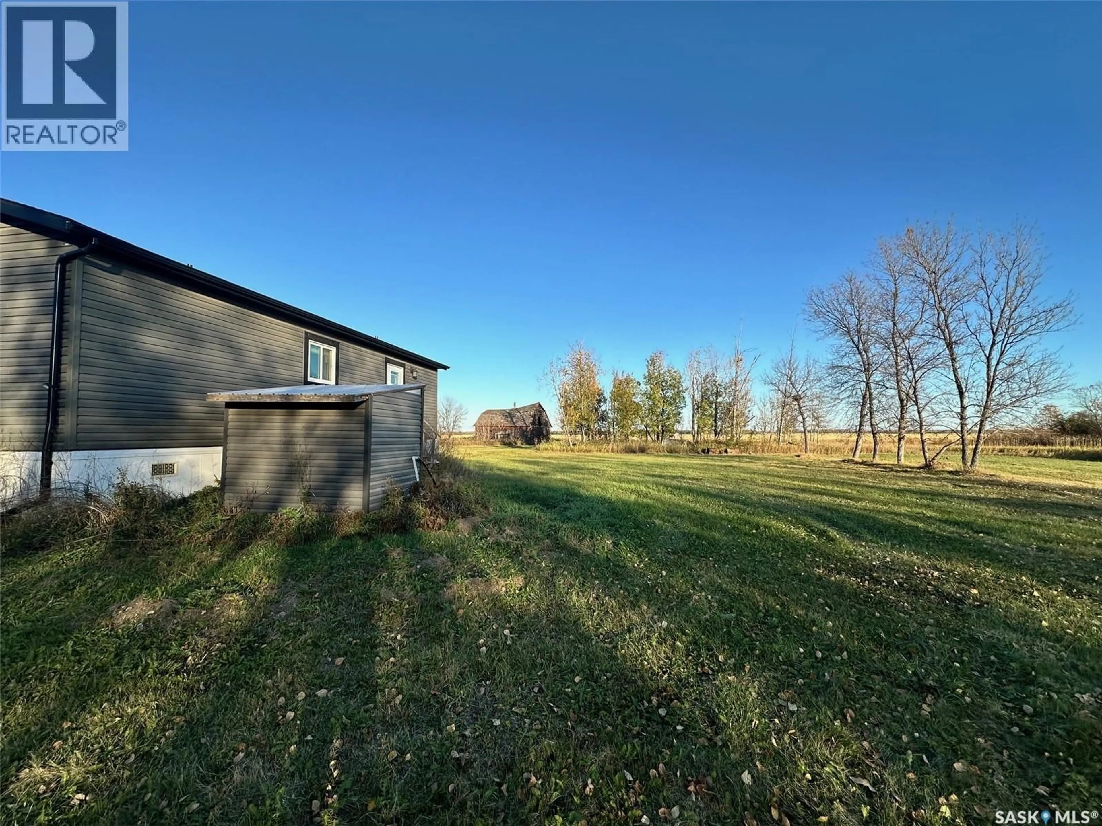 A pic from outside/outdoor area/front of a property/back of a property/a pic from drone, forest/trees view for MARSHALL ACREAGE, Hudson Bay Saskatchewan S0E0Y0