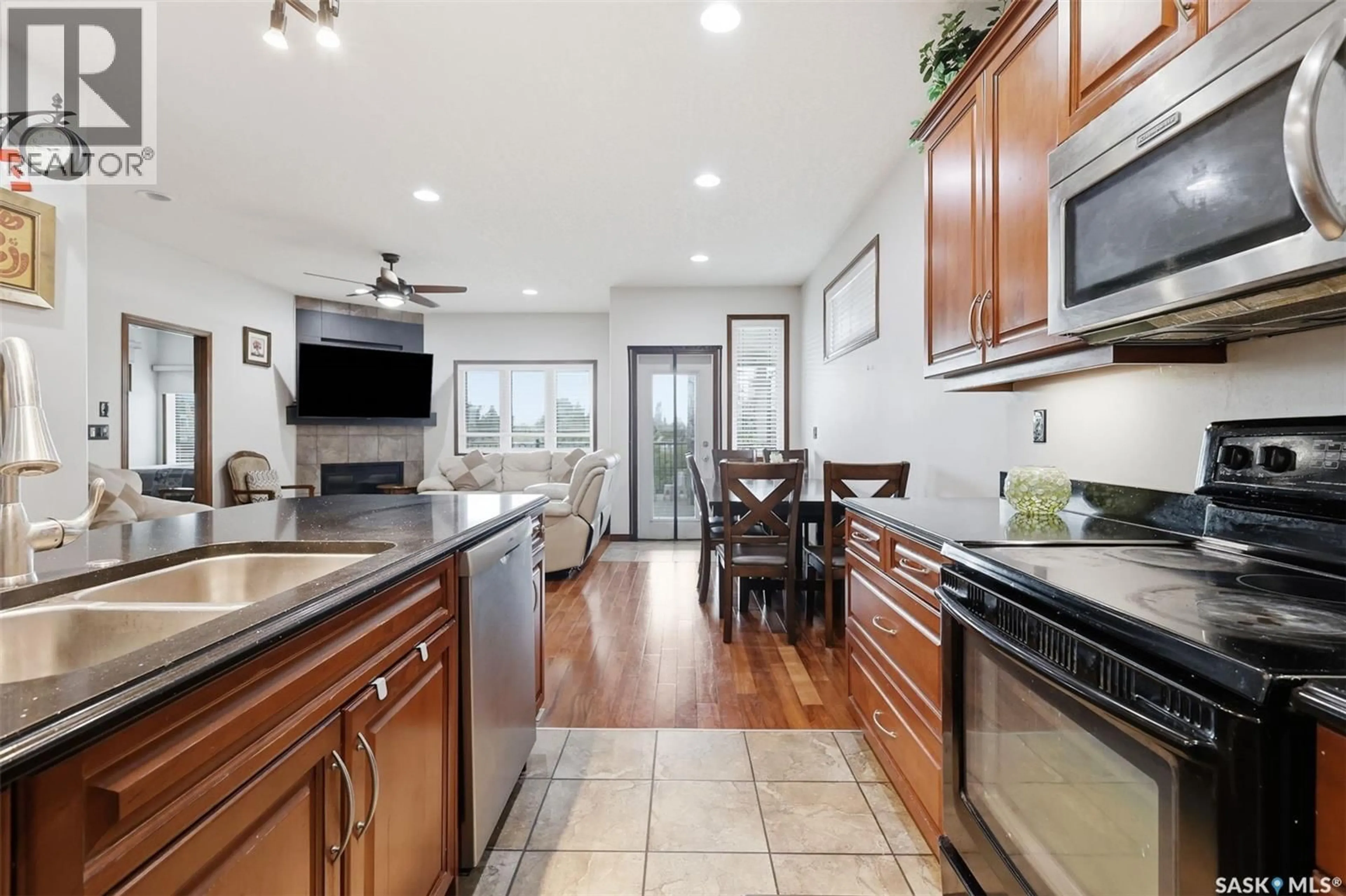 Open concept kitchen, ceramic/tile floor for 206 MUZYKA ROAD, Saskatoon Saskatchewan S7W0G9