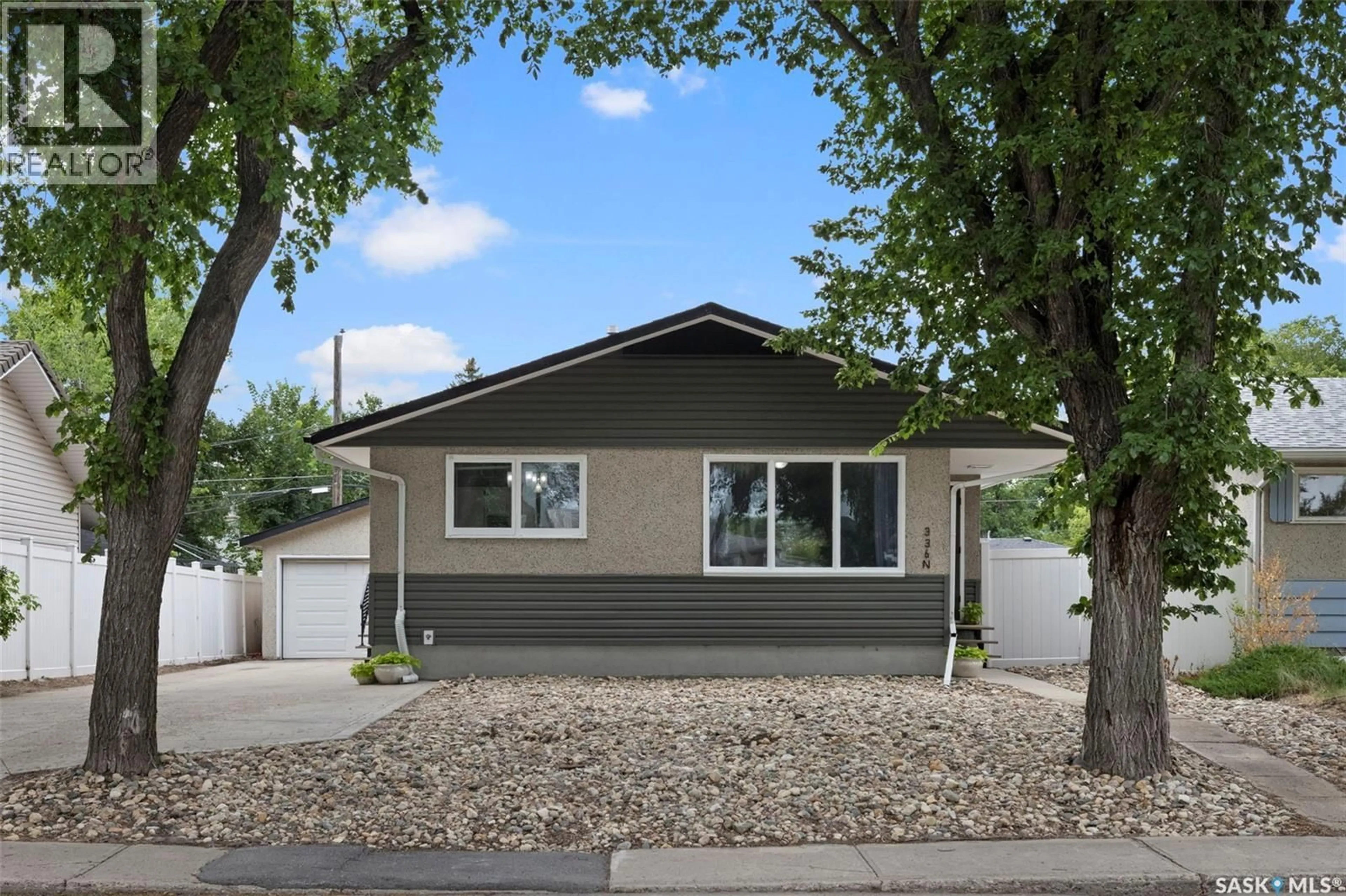 Home with vinyl exterior material, street for 336 TORONTO STREET, Regina Saskatchewan S4R2T8