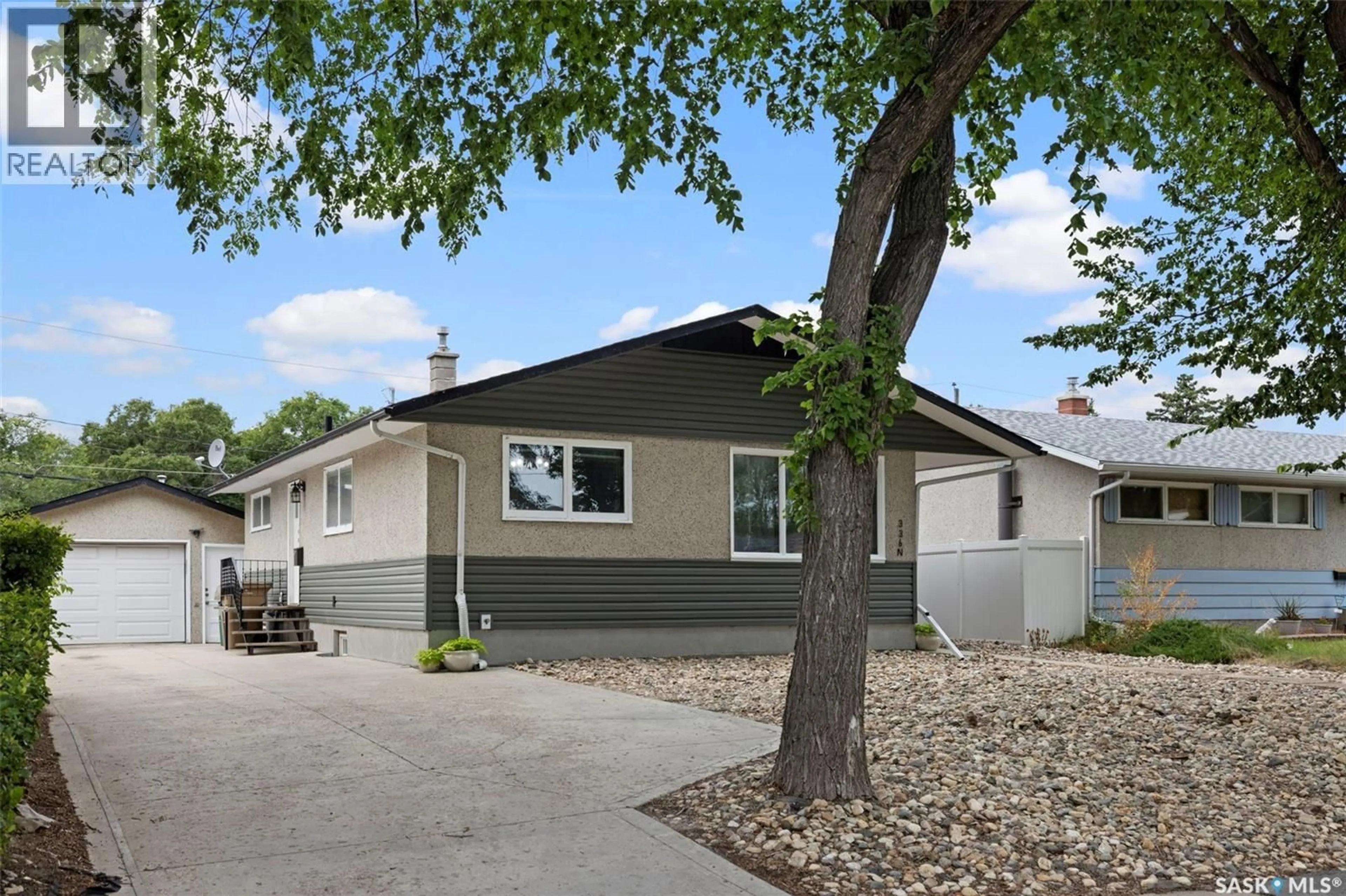 Home with vinyl exterior material, street for 336 TORONTO STREET, Regina Saskatchewan S4R2T8