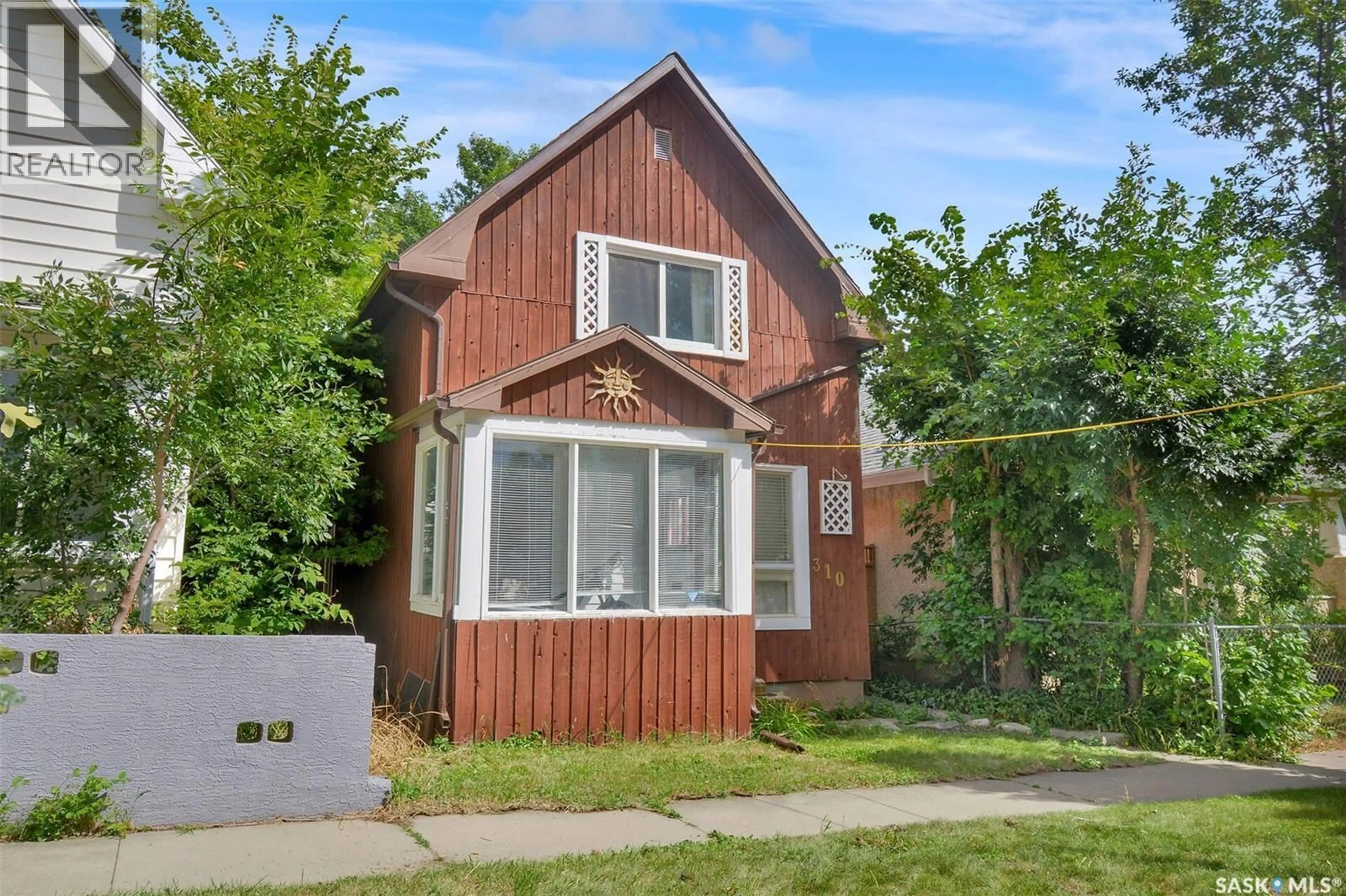 Home with brick exterior material, street for 310 J AVENUE, Saskatoon Saskatchewan S7L2K2