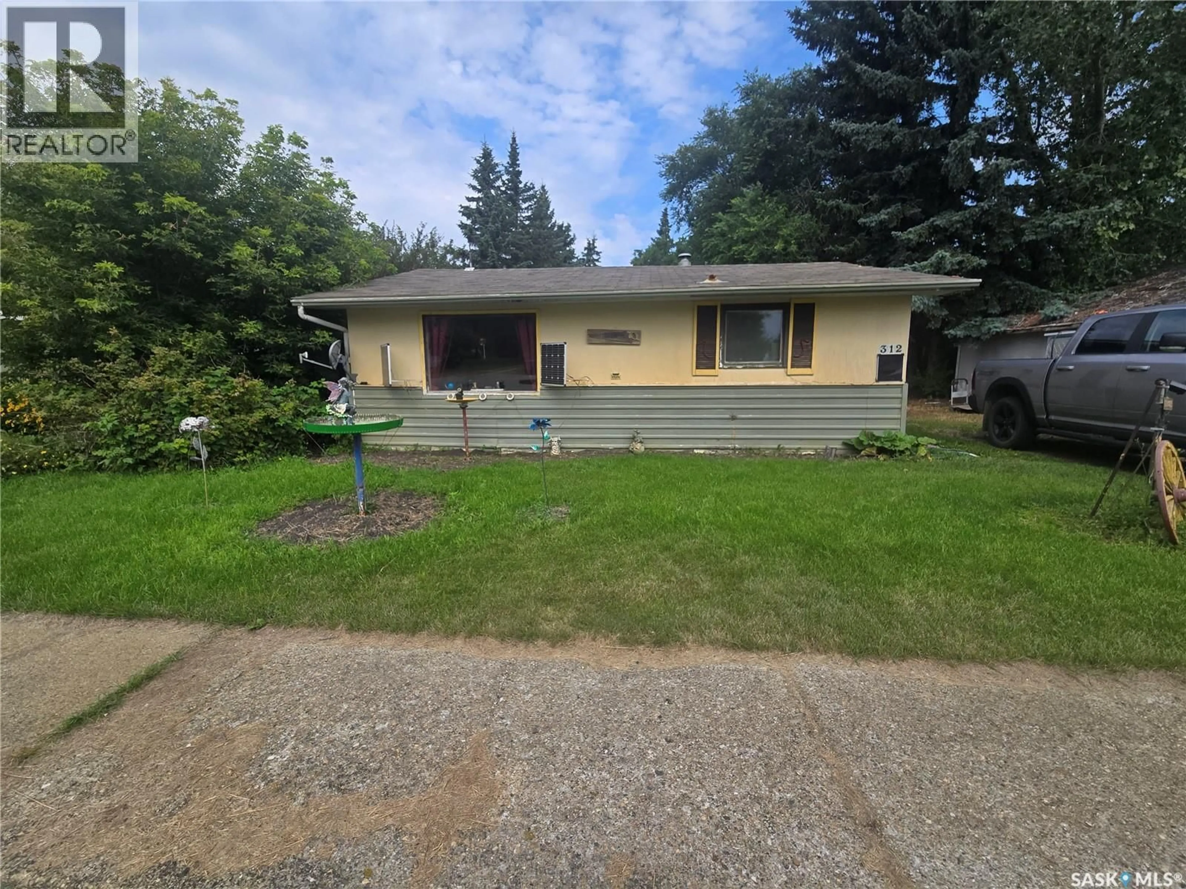 Home with vinyl exterior material, street for 312 MAIN STREET, Kennedy Saskatchewan S0G2R0