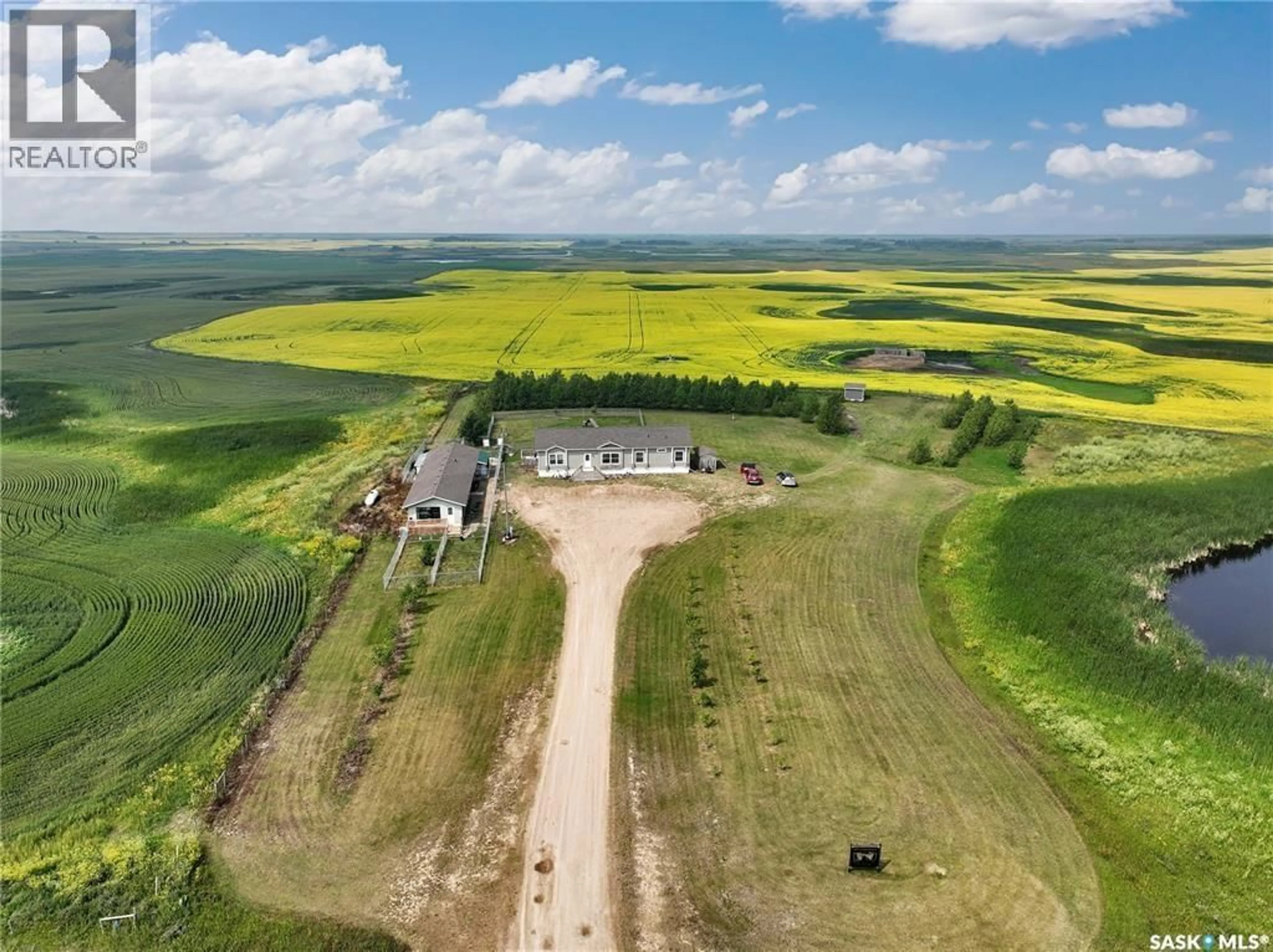 A pic from outside/outdoor area/front of a property/back of a property/a pic from drone, building for ENVY DOG HOUSE ACREAGE, Silverwood Rm No. 123 Saskatchewan S0G4Z0