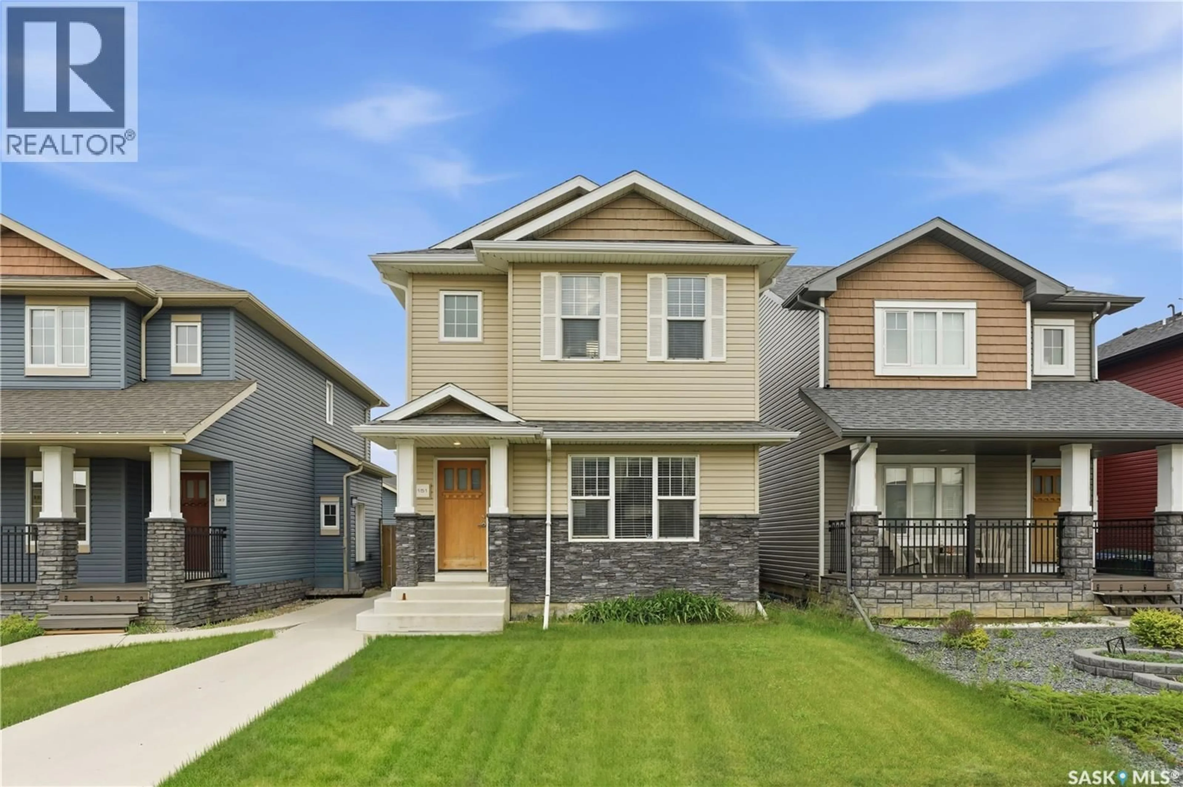 Home with vinyl exterior material, street for 151 TWEED LANE, Saskatoon Saskatchewan S7V0K1