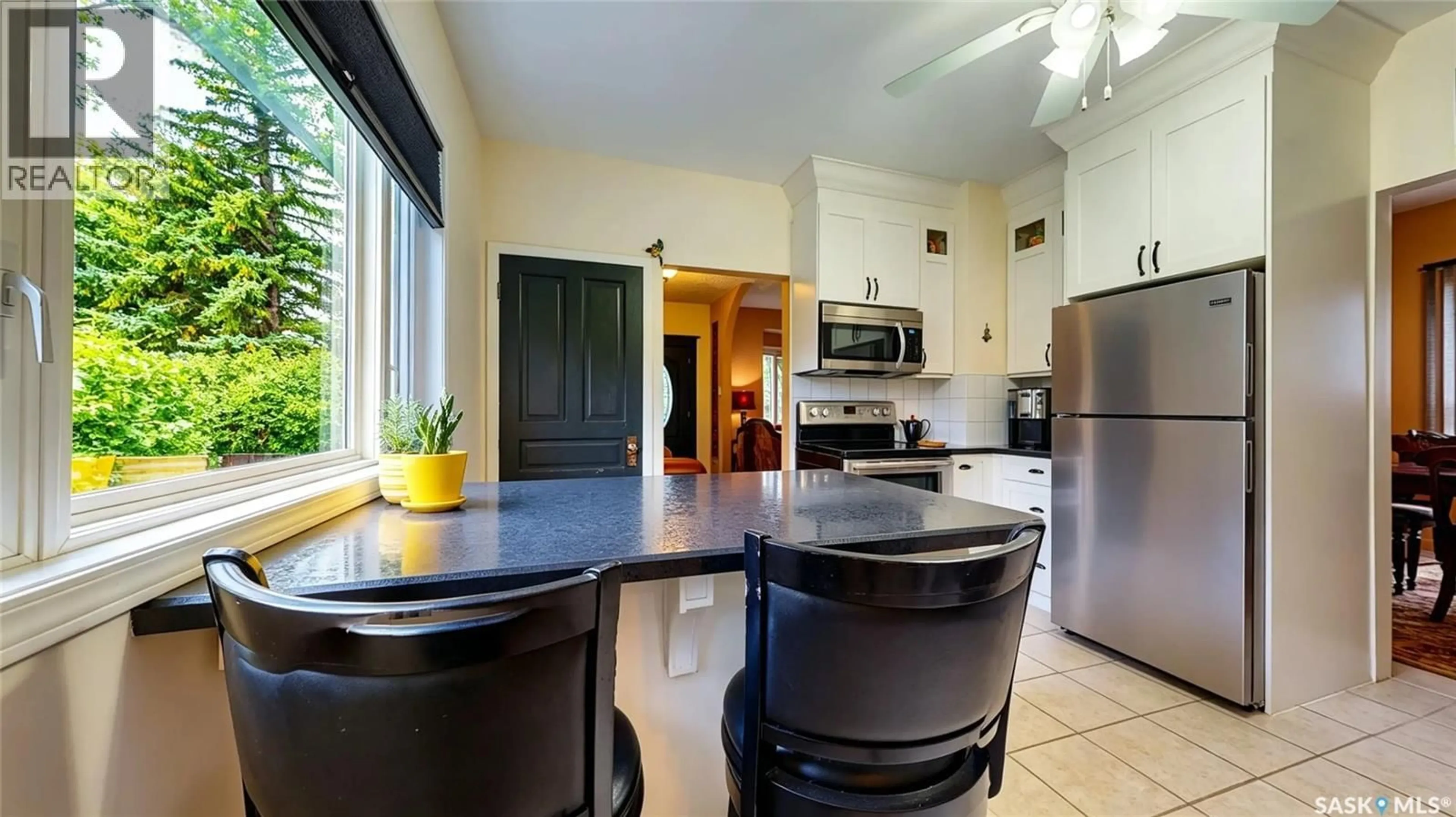 Open concept kitchen, ceramic/tile floor for 210 HOOD STREET, Maple Creek Saskatchewan S0N1N0