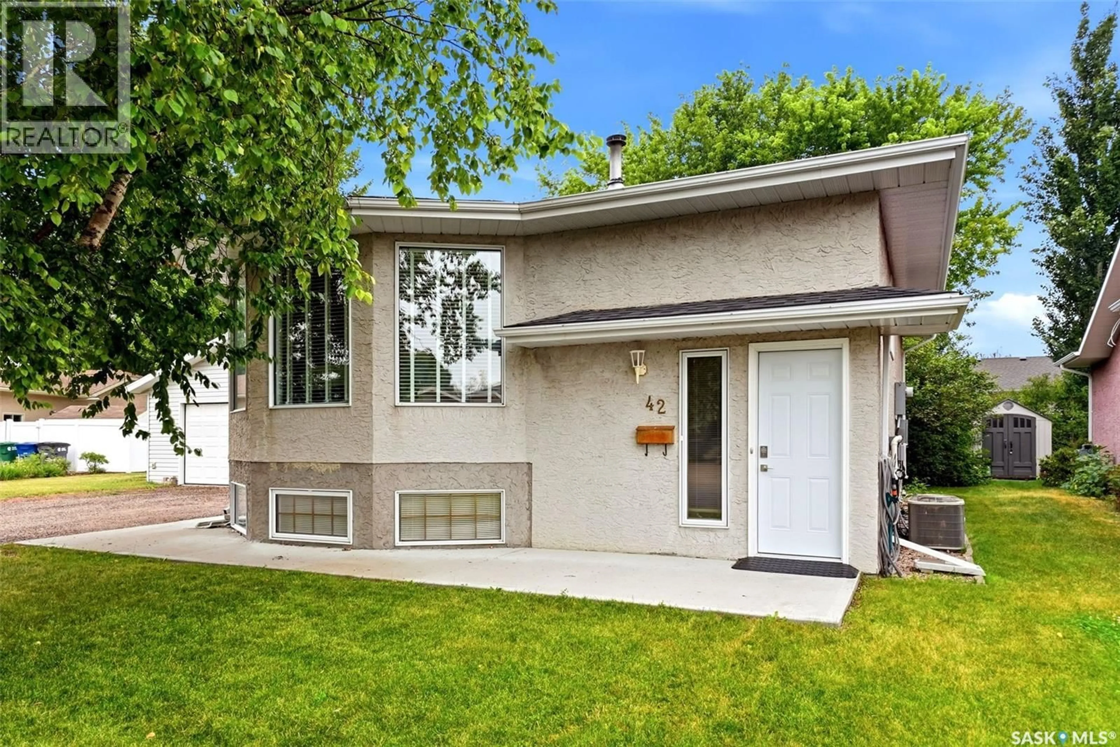 Home with vinyl exterior material, street for 42 WAGNER BAY, Balgonie Saskatchewan S0G0E0