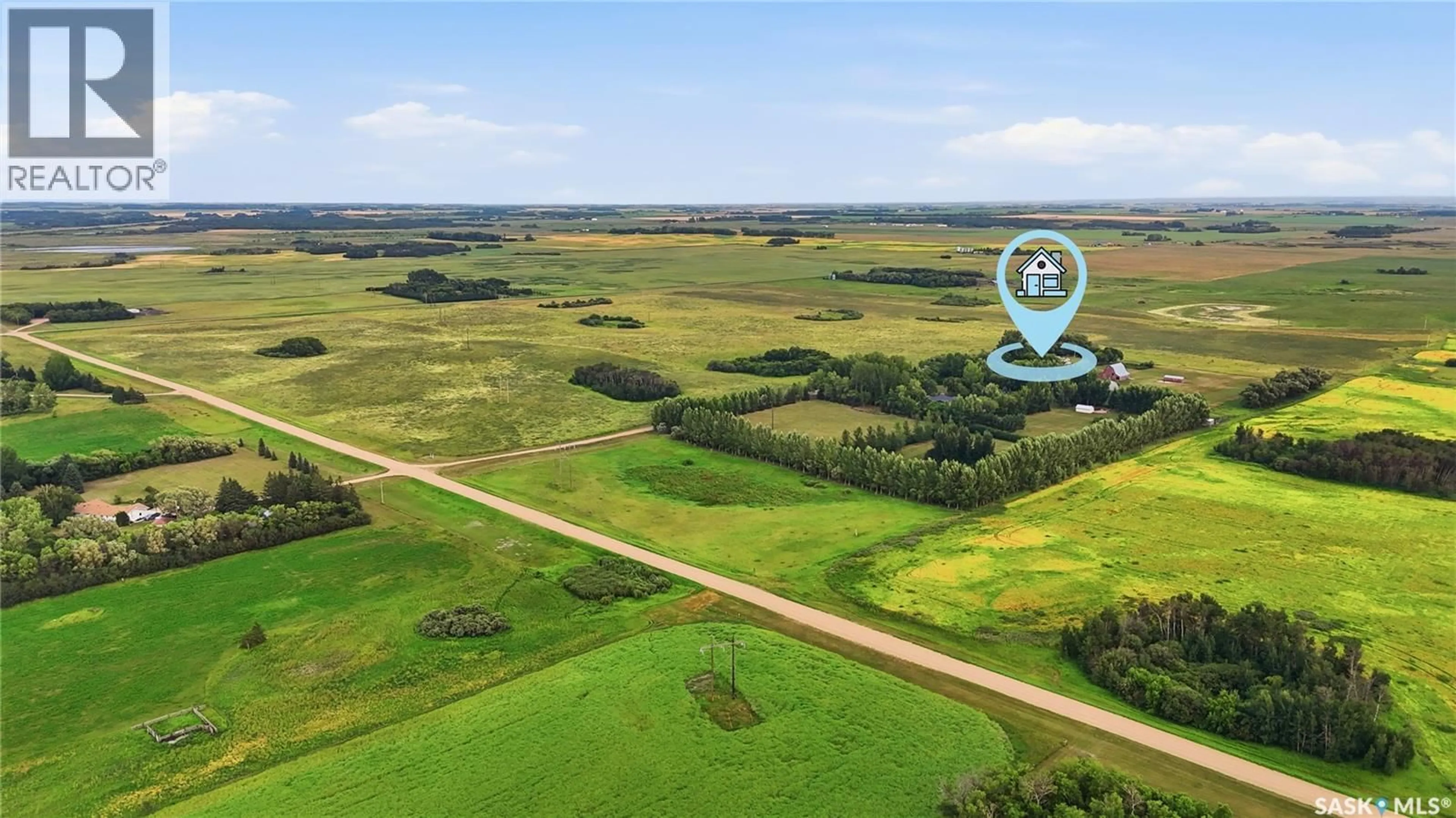 A pic from outside/outdoor area/front of a property/back of a property/a pic from drone, water/lake/river/ocean view for BLUE ACREAGE, Corman Park Rm No. 344 Saskatchewan S0K0Y0