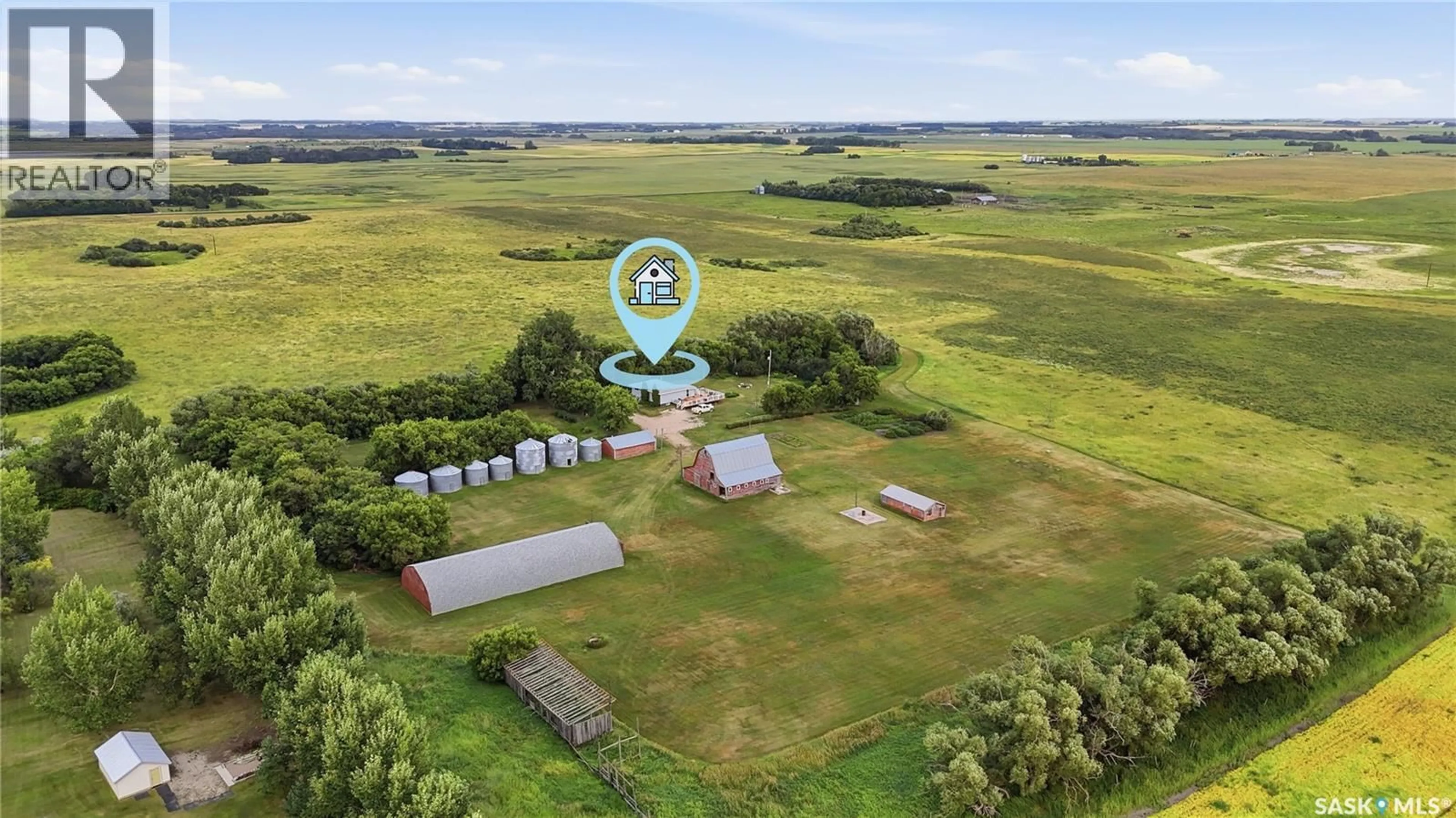A pic from outside/outdoor area/front of a property/back of a property/a pic from drone, unknown for BLUE ACREAGE, Corman Park Rm No. 344 Saskatchewan S0K0Y0