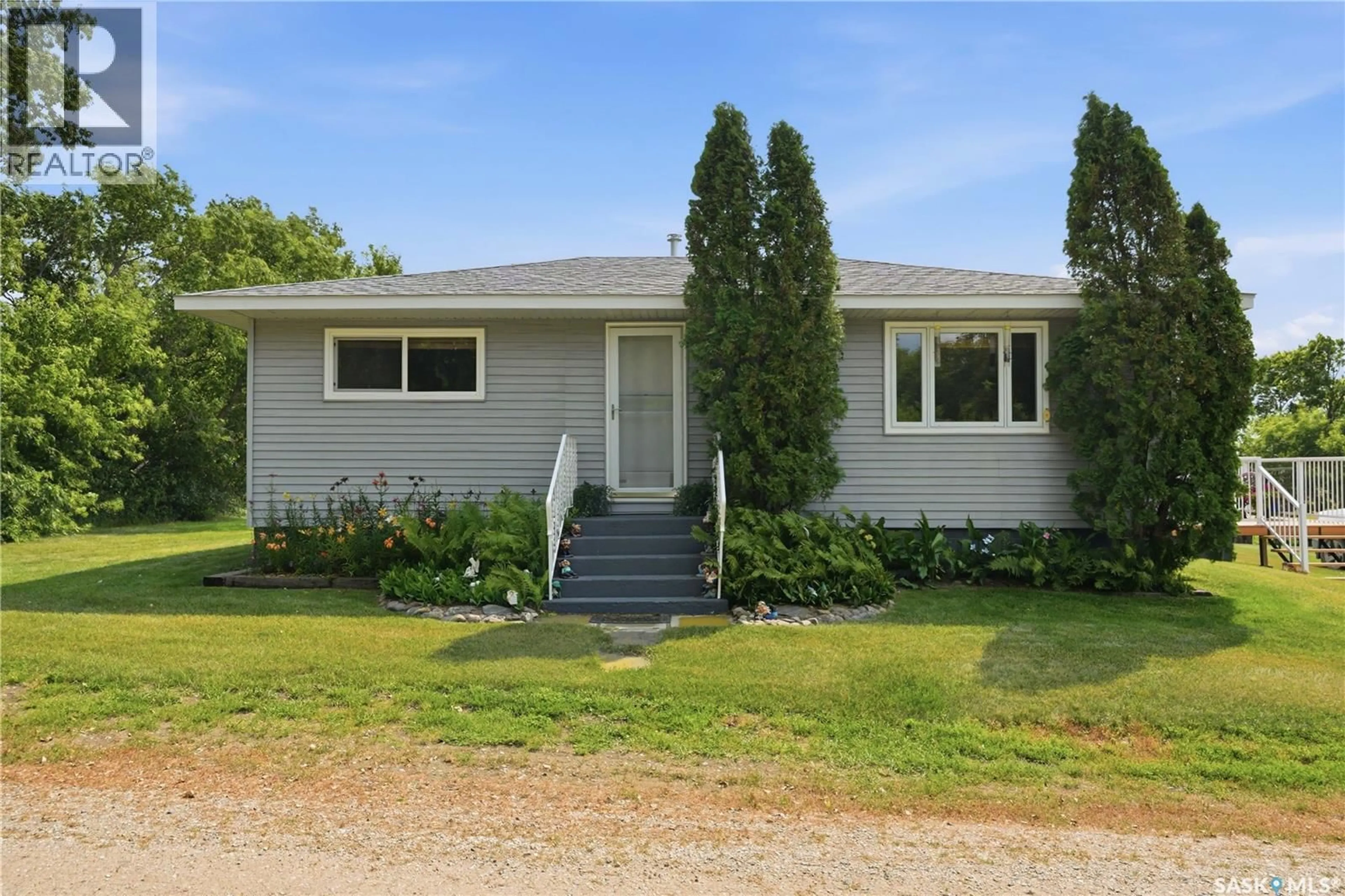 Home with vinyl exterior material, street for BLUE ACREAGE, Corman Park Rm No. 344 Saskatchewan S0K0Y0