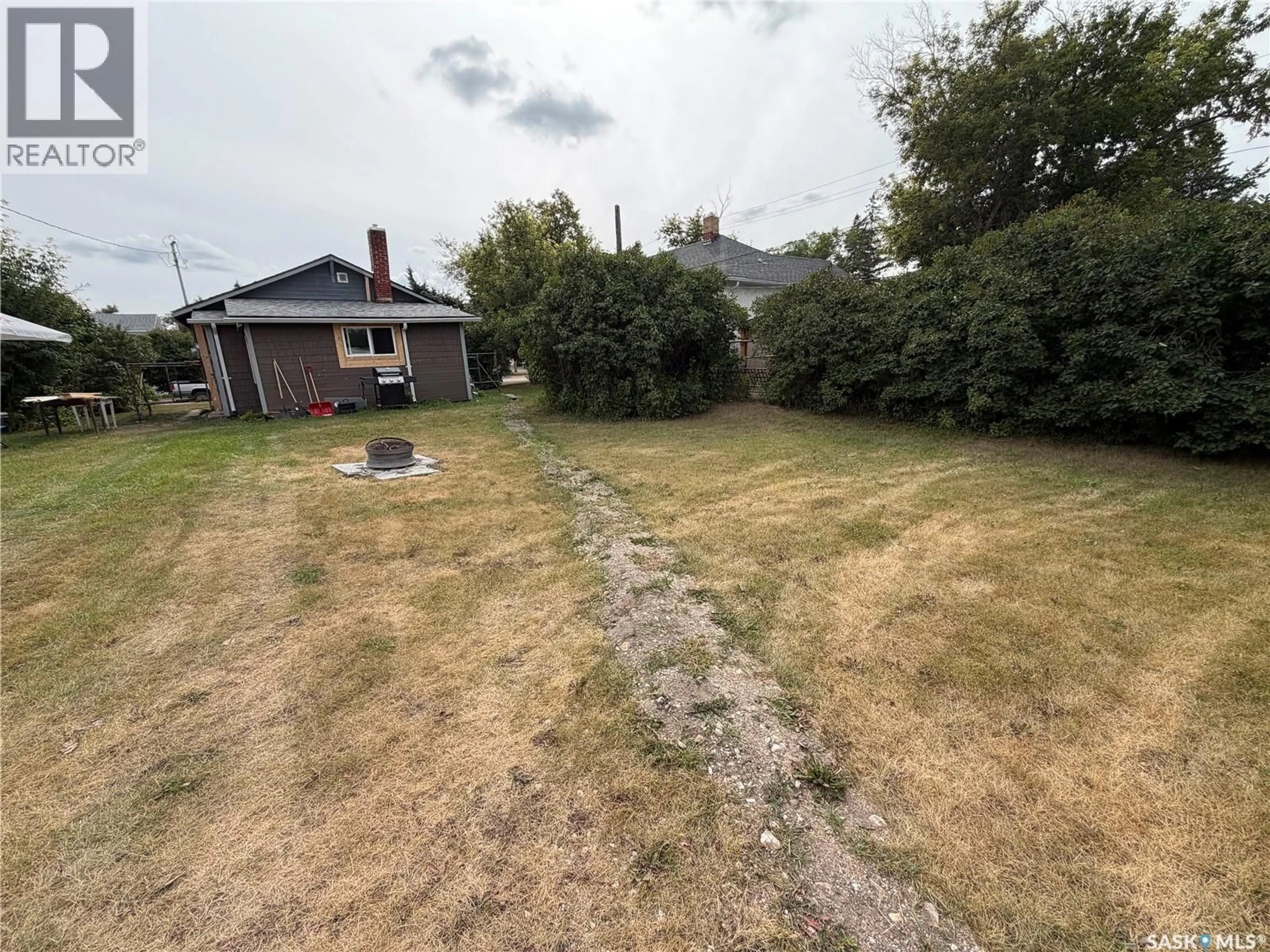 A pic from outside/outdoor area/front of a property/back of a property/a pic from drone, street for 312 7TH AVENUE, Melville Saskatchewan S0A2P0