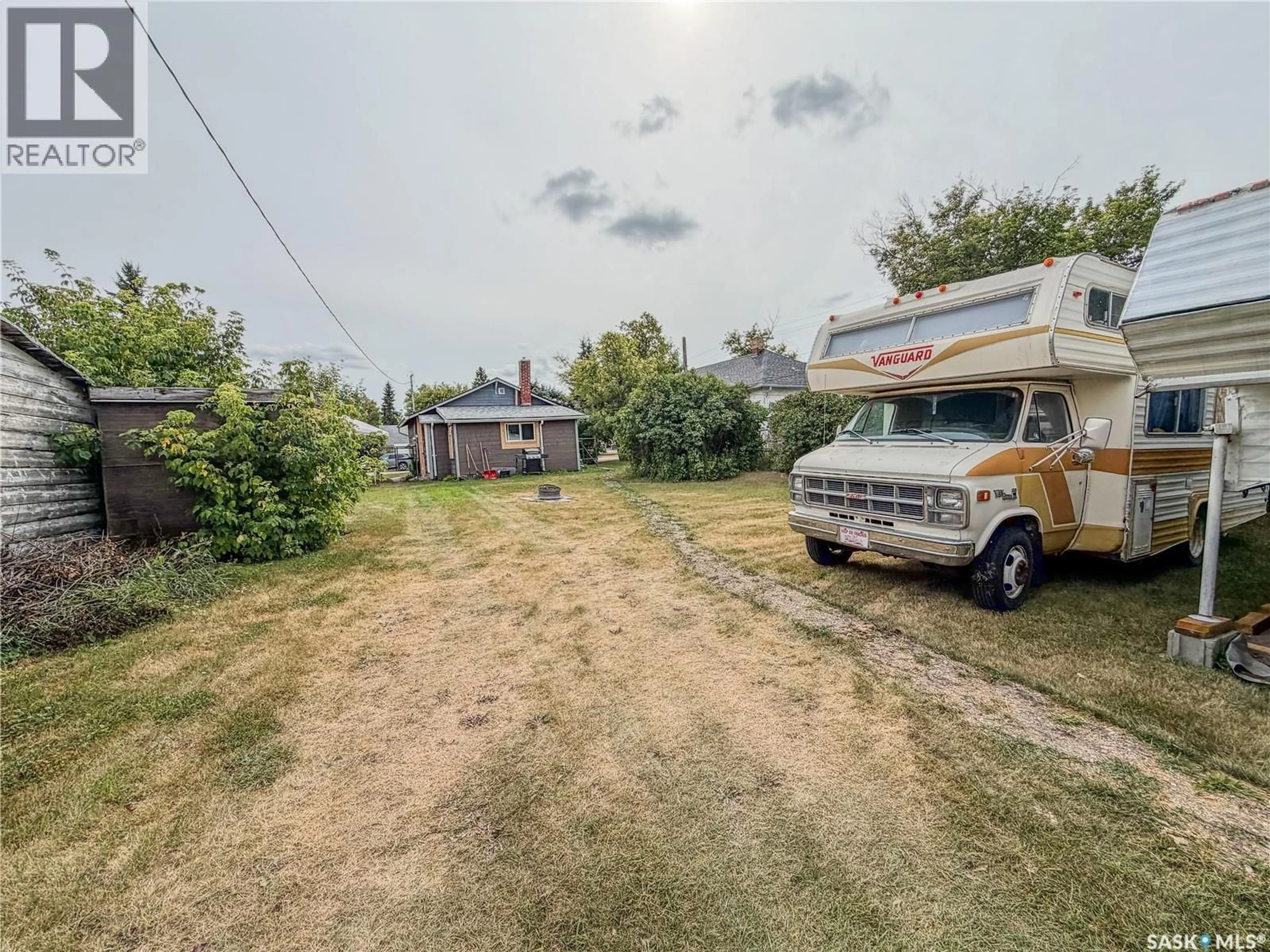 A pic from outside/outdoor area/front of a property/back of a property/a pic from drone, street for 312 7TH AVENUE, Melville Saskatchewan S0A2P0