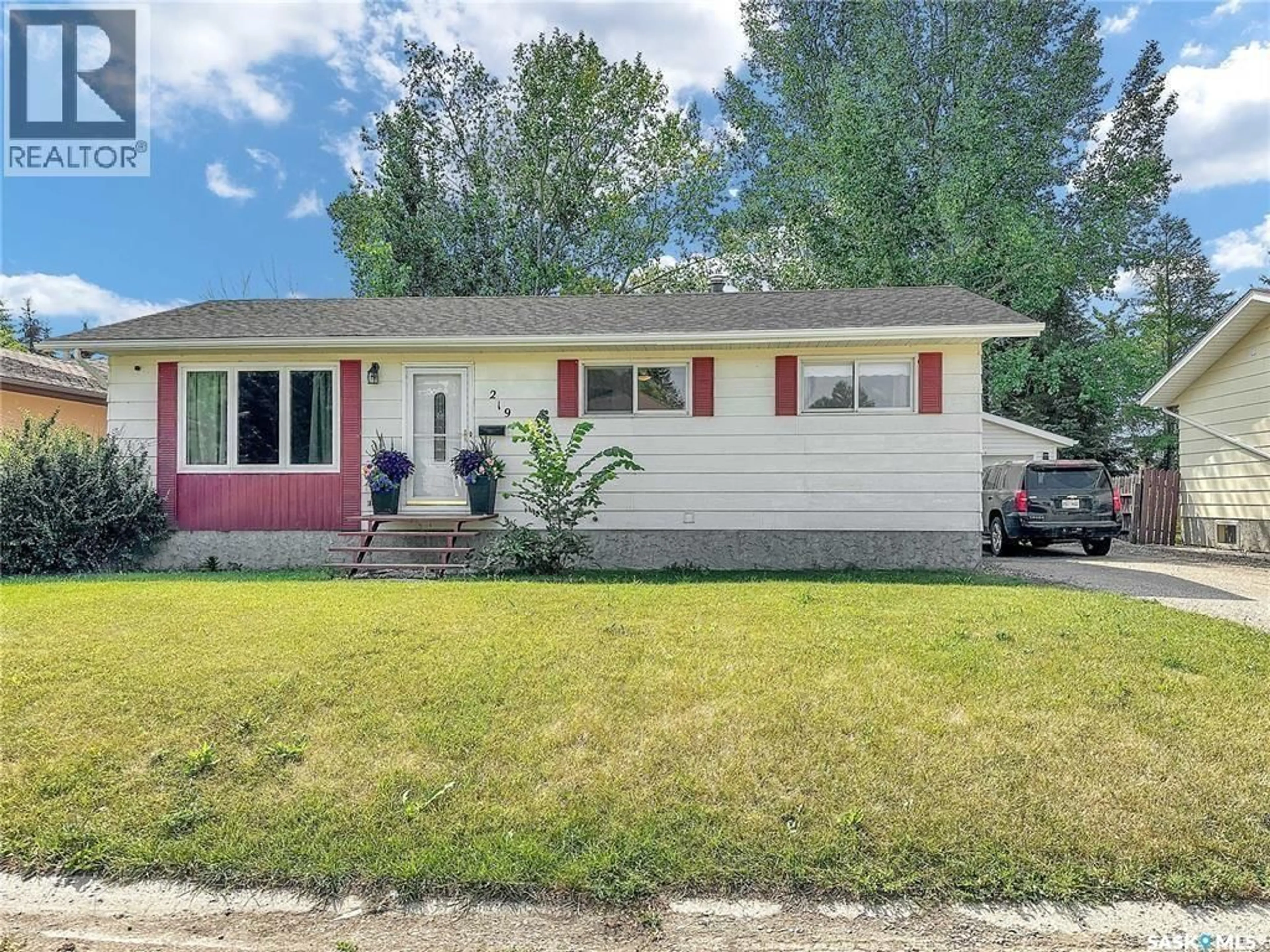 Home with vinyl exterior material, street for 219 4TH AVENUE, Whitewood Saskatchewan S0G5C0