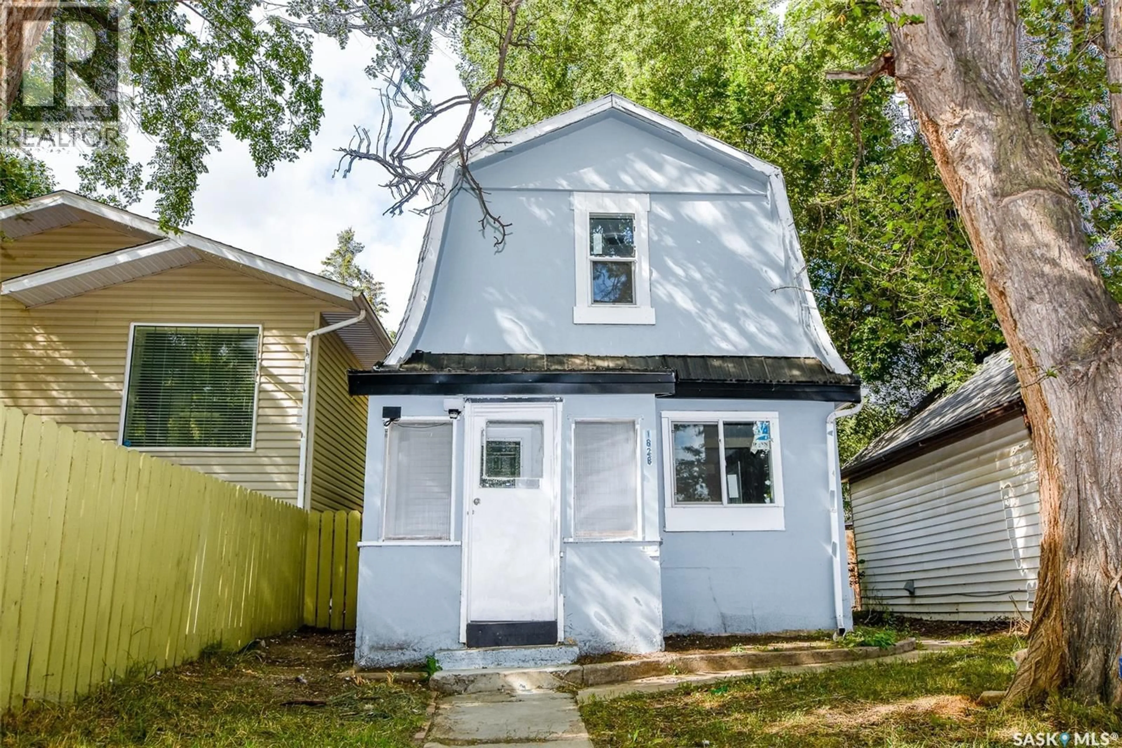 Home with vinyl exterior material, street for 1626 19TH STREET, Saskatoon Saskatchewan S7M1C6