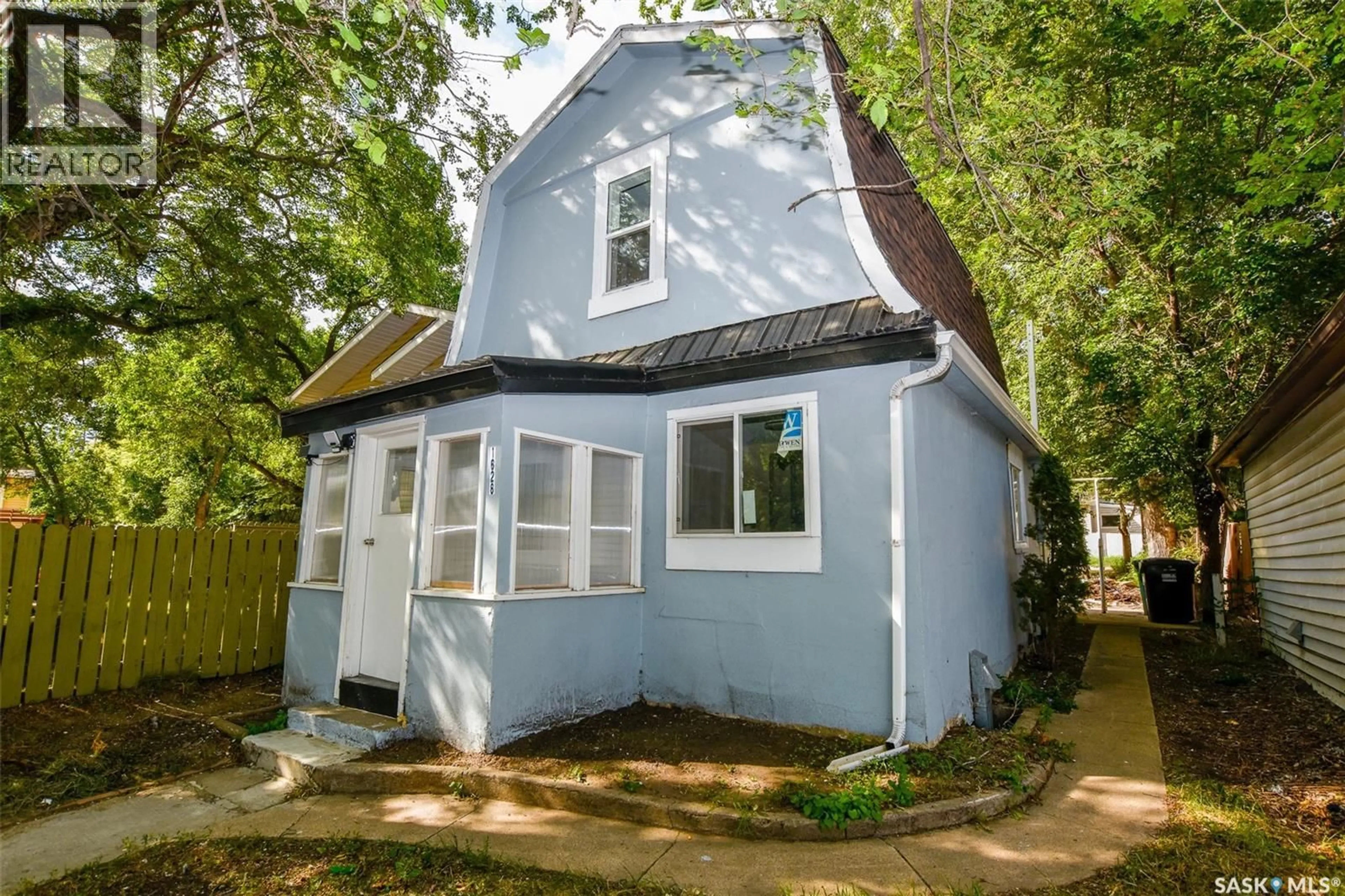 Home with vinyl exterior material, street for 1626 19TH STREET, Saskatoon Saskatchewan S7M1C6