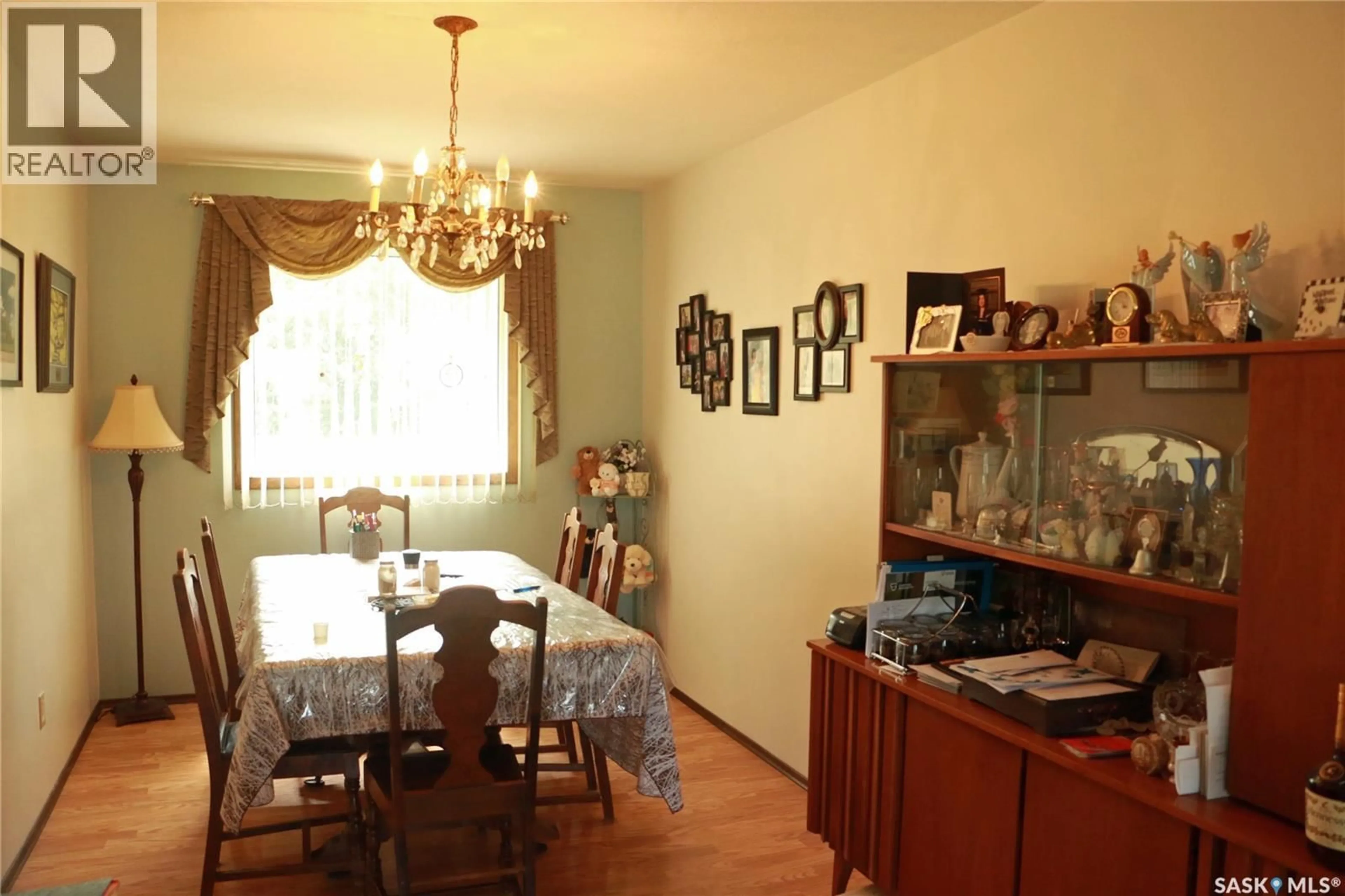 Dining room, wood/laminate floor for 304 ROSHER STREET, Colonsay Saskatchewan S0K0Z0