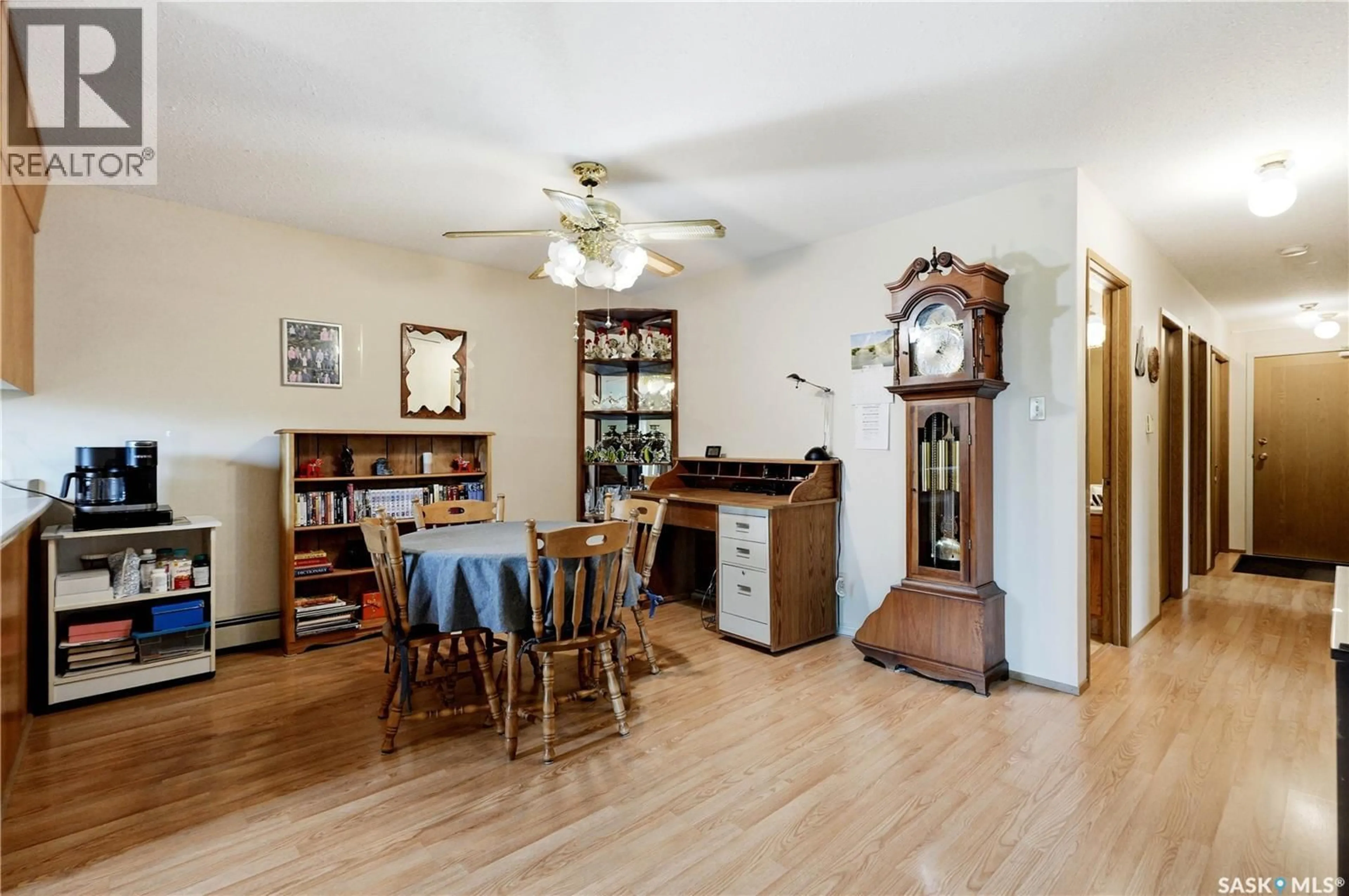 Dining room, wood/laminate floor for 308 - 3140 LOUISE STREET, Saskatoon Saskatchewan S7J3L8