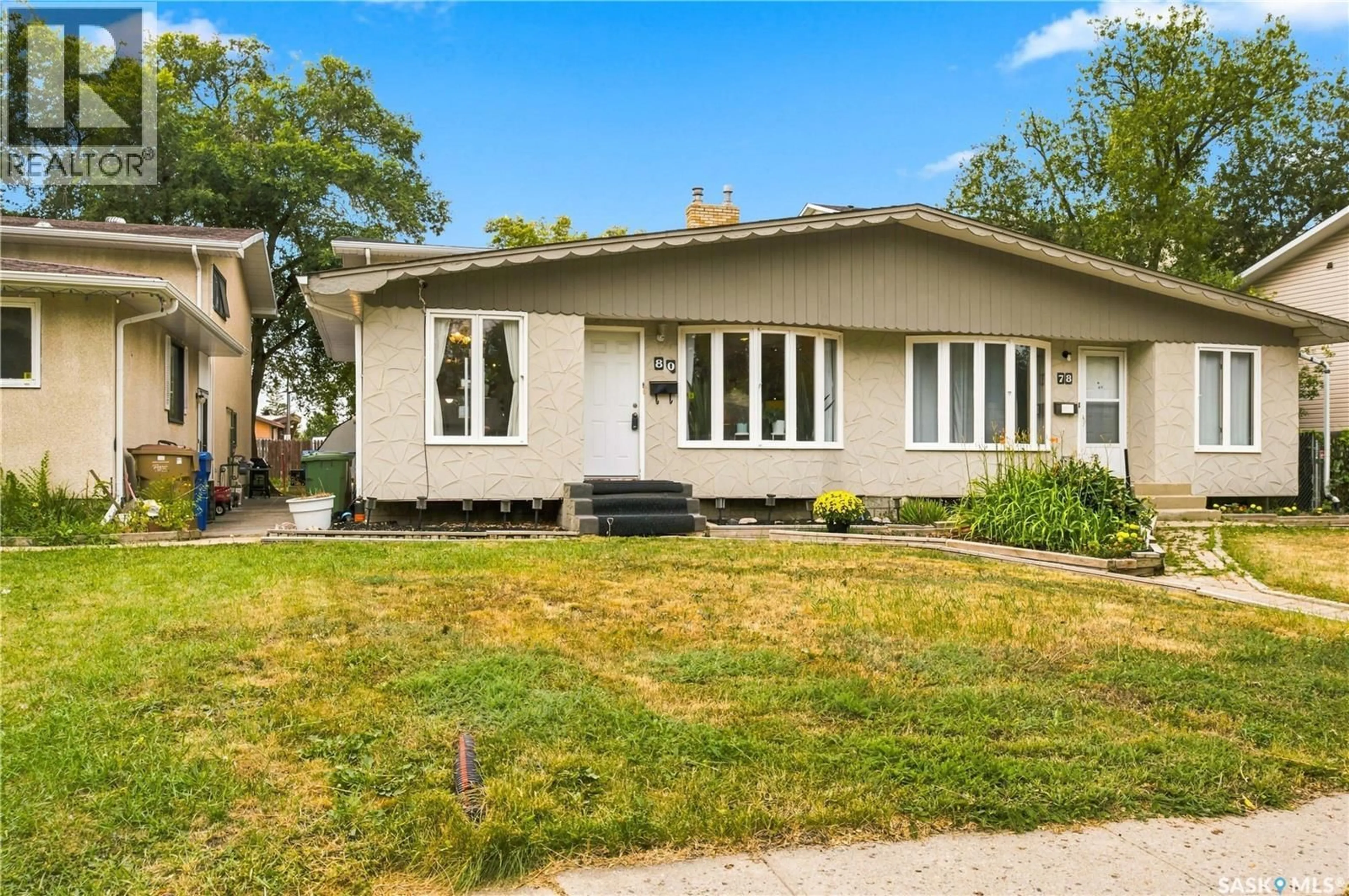 Home with vinyl exterior material, street for 80 SPENCE STREET, Regina Saskatchewan S4S4H4