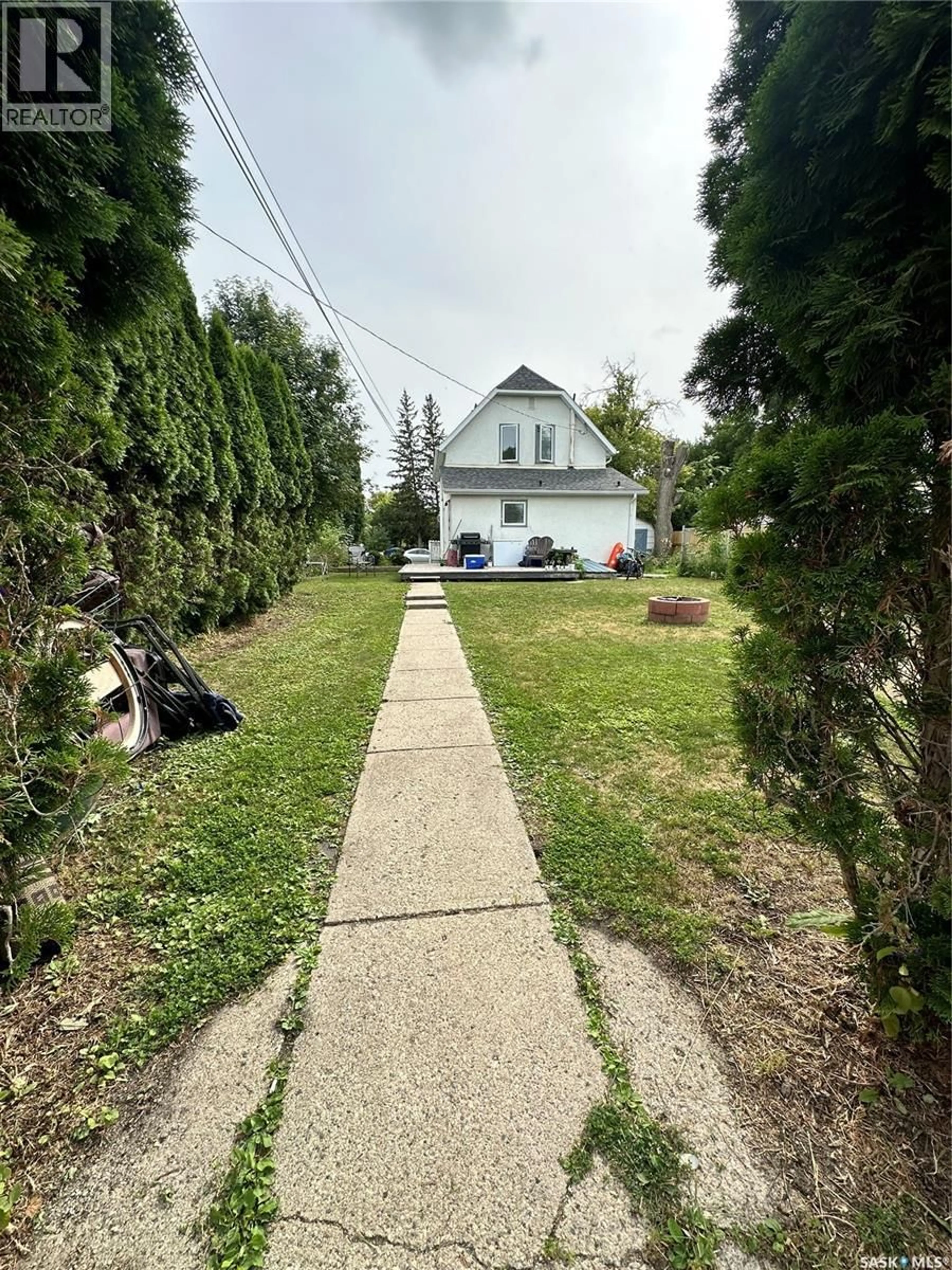 A pic from outside/outdoor area/front of a property/back of a property/a pic from drone, street for 118 5TH AVENUE, Melville Saskatchewan S0A2P0