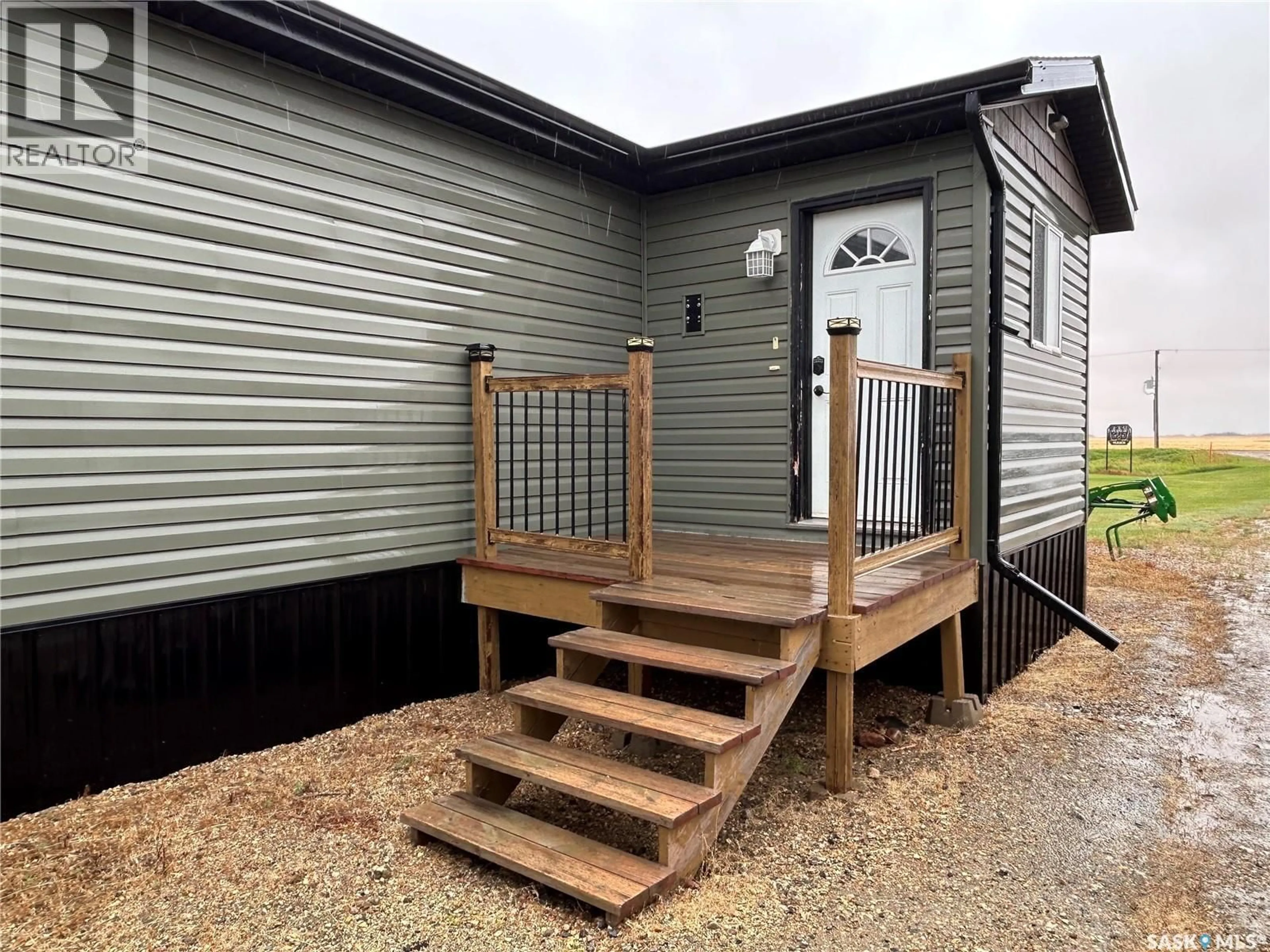 Home with vinyl exterior material, street for BENSON ACREAGE, Benson Rm No. 35 Saskatchewan S0C0L0