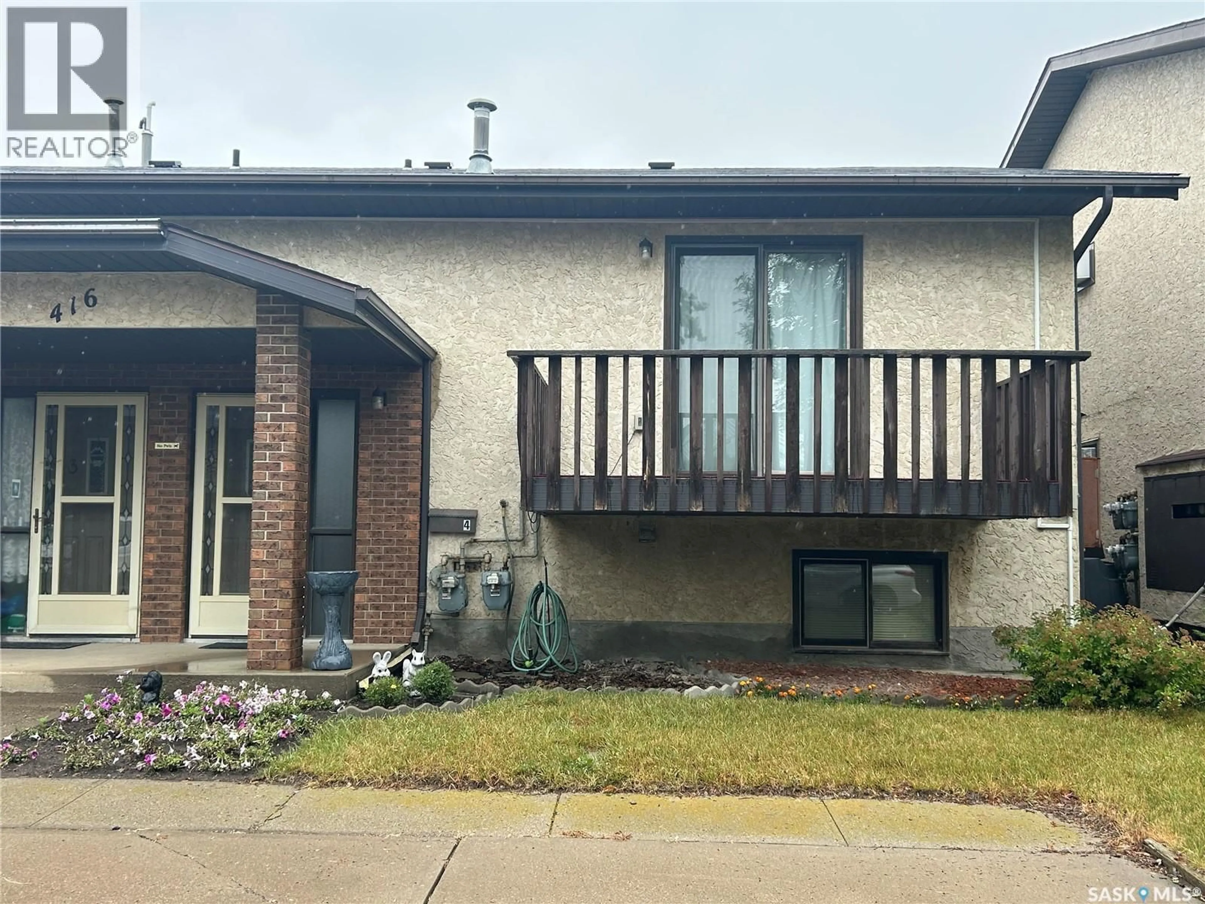 Home with brick exterior material, street for 416 - 4 HERITAGE DRIVE, Estevan Saskatchewan S4A2N4
