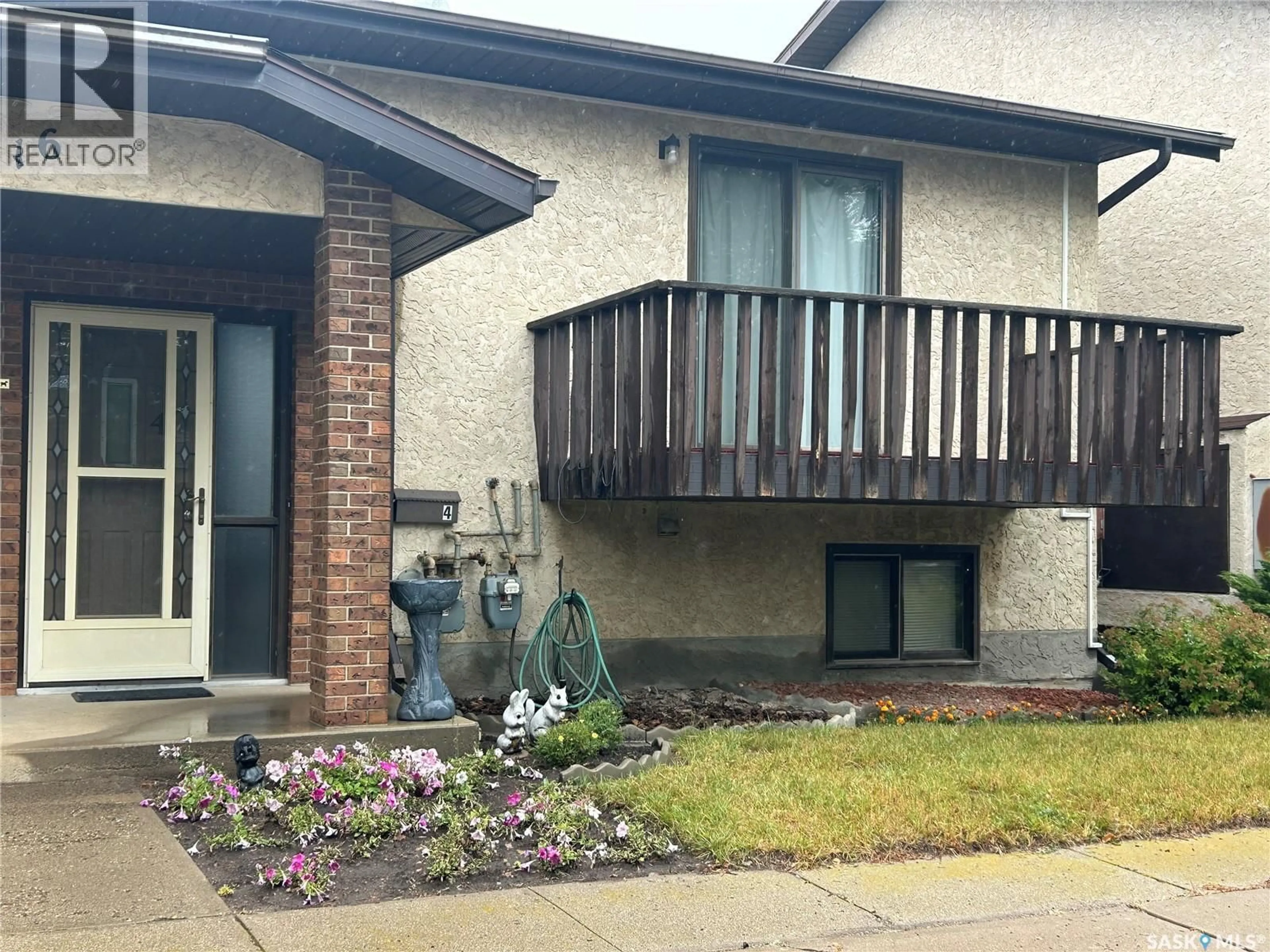 Home with brick exterior material, street for 416 - 4 HERITAGE DRIVE, Estevan Saskatchewan S4A2N4