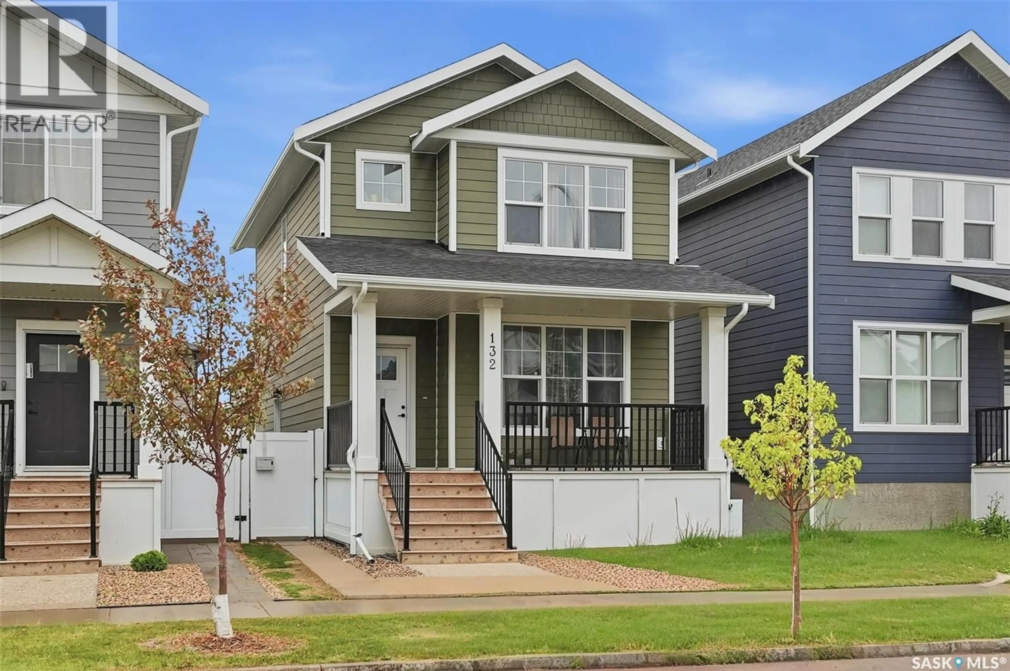 Home with vinyl exterior material, street for E - 132 ROSEWOOD BOULEVARD, Saskatoon Saskatchewan S7V0Y7