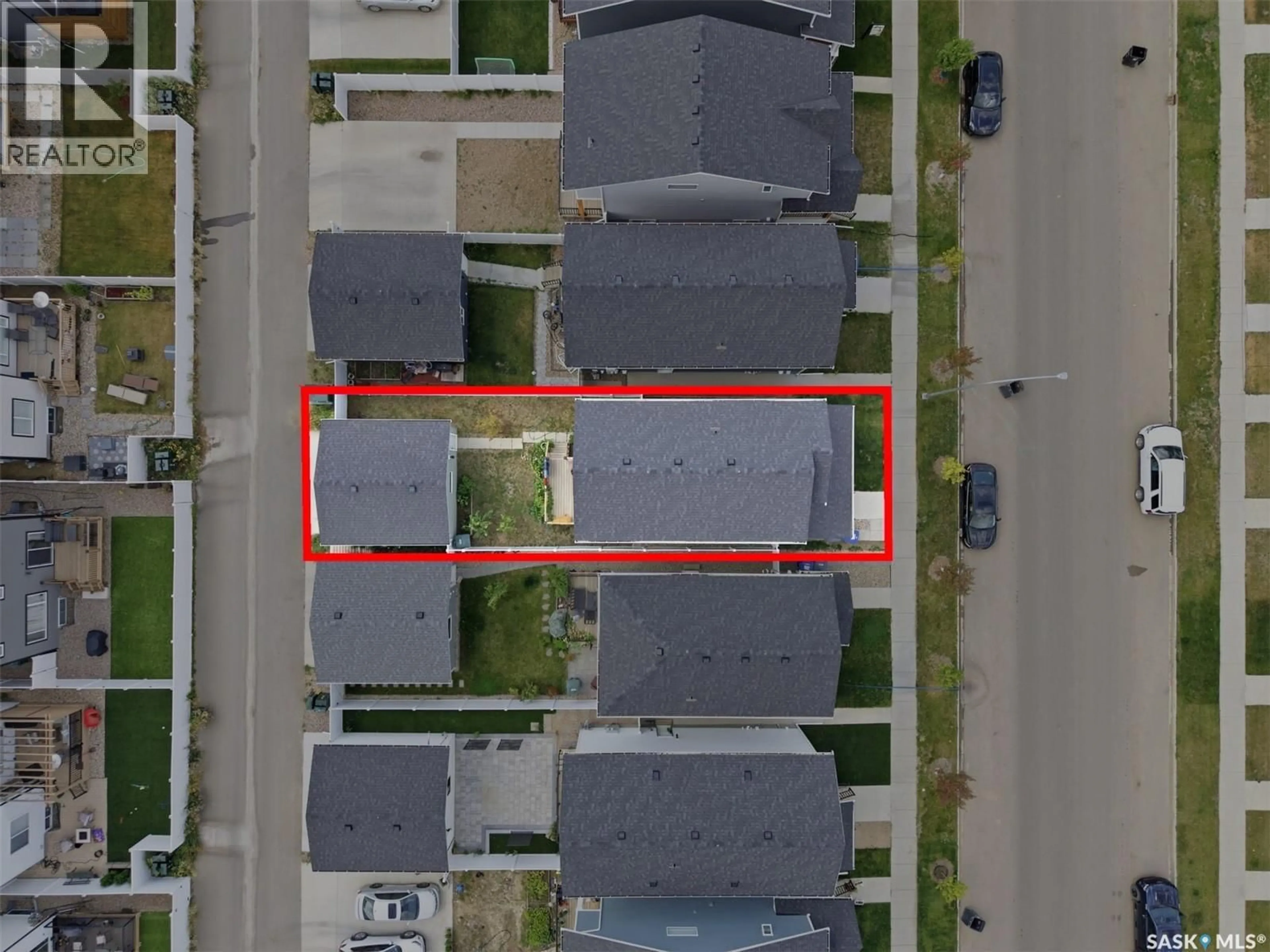 A pic from outside/outdoor area/front of a property/back of a property/a pic from drone, street for E - 132 ROSEWOOD BOULEVARD, Saskatoon Saskatchewan S7V0Y7
