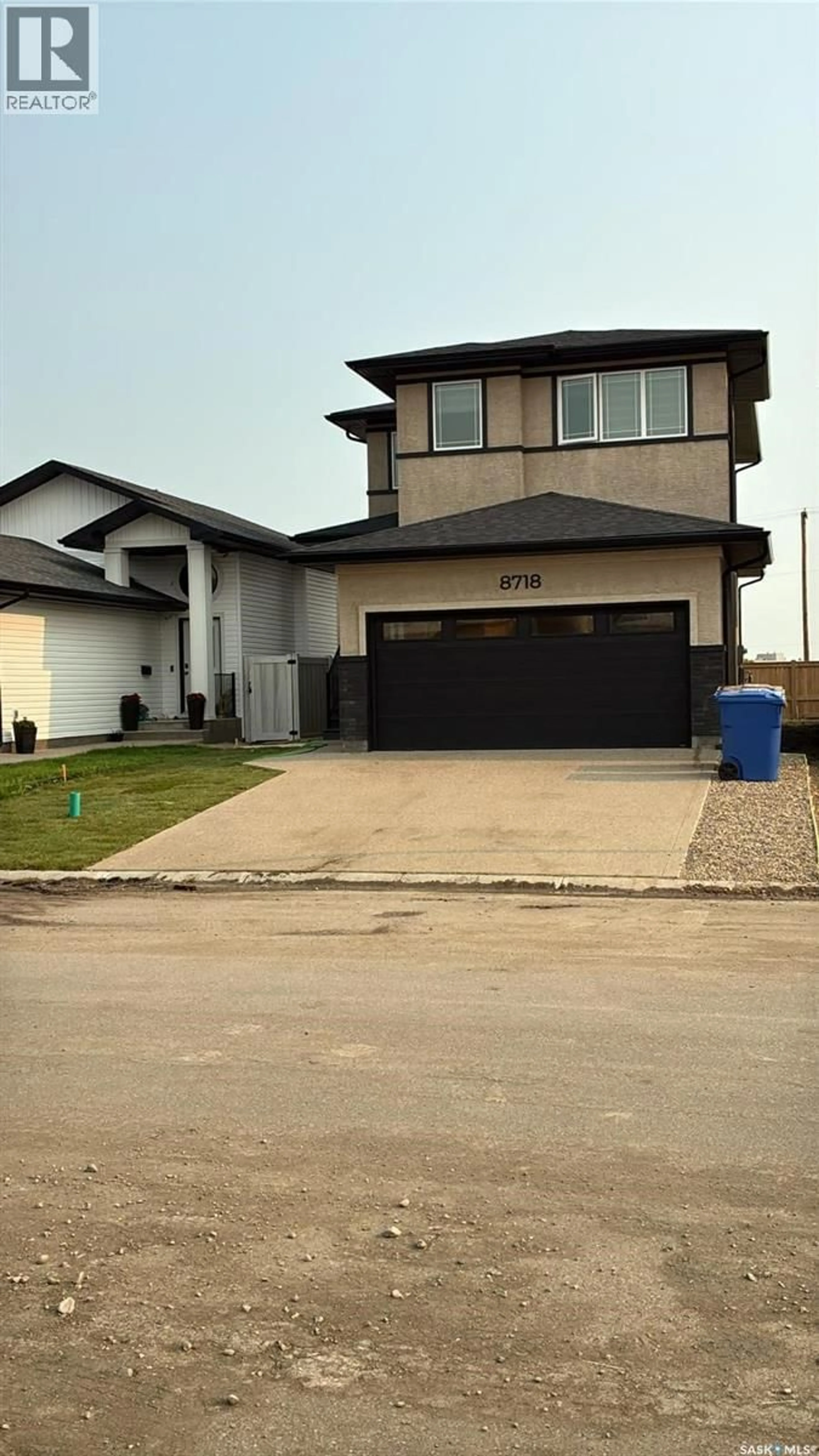 Home with vinyl exterior material, street for 8718 WHEAT CRESCENT, Regina Saskatchewan S4Y0H4