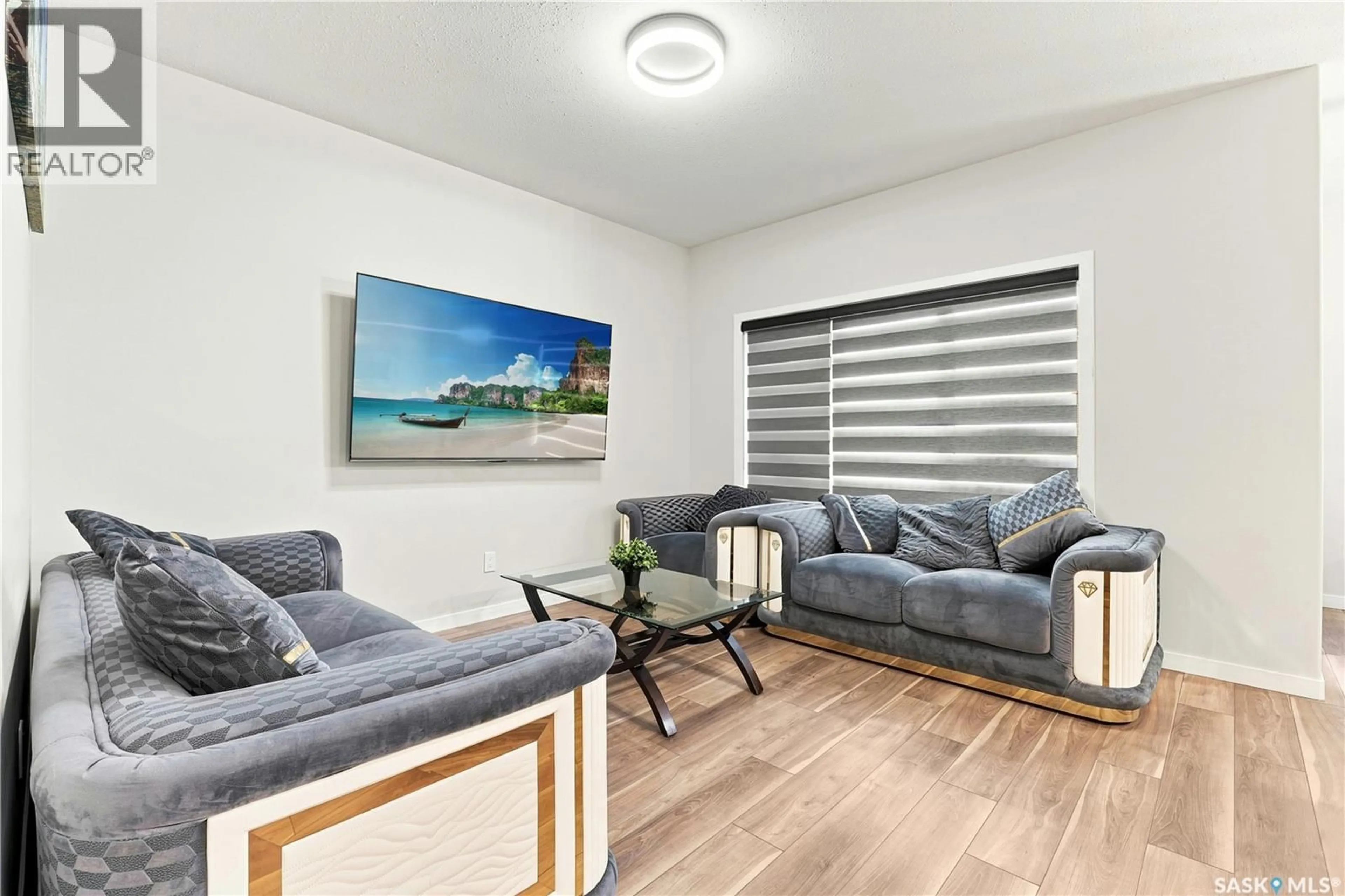 Living room with furniture, unknown for 8718 WHEAT CRESCENT, Regina Saskatchewan S4Y0H4