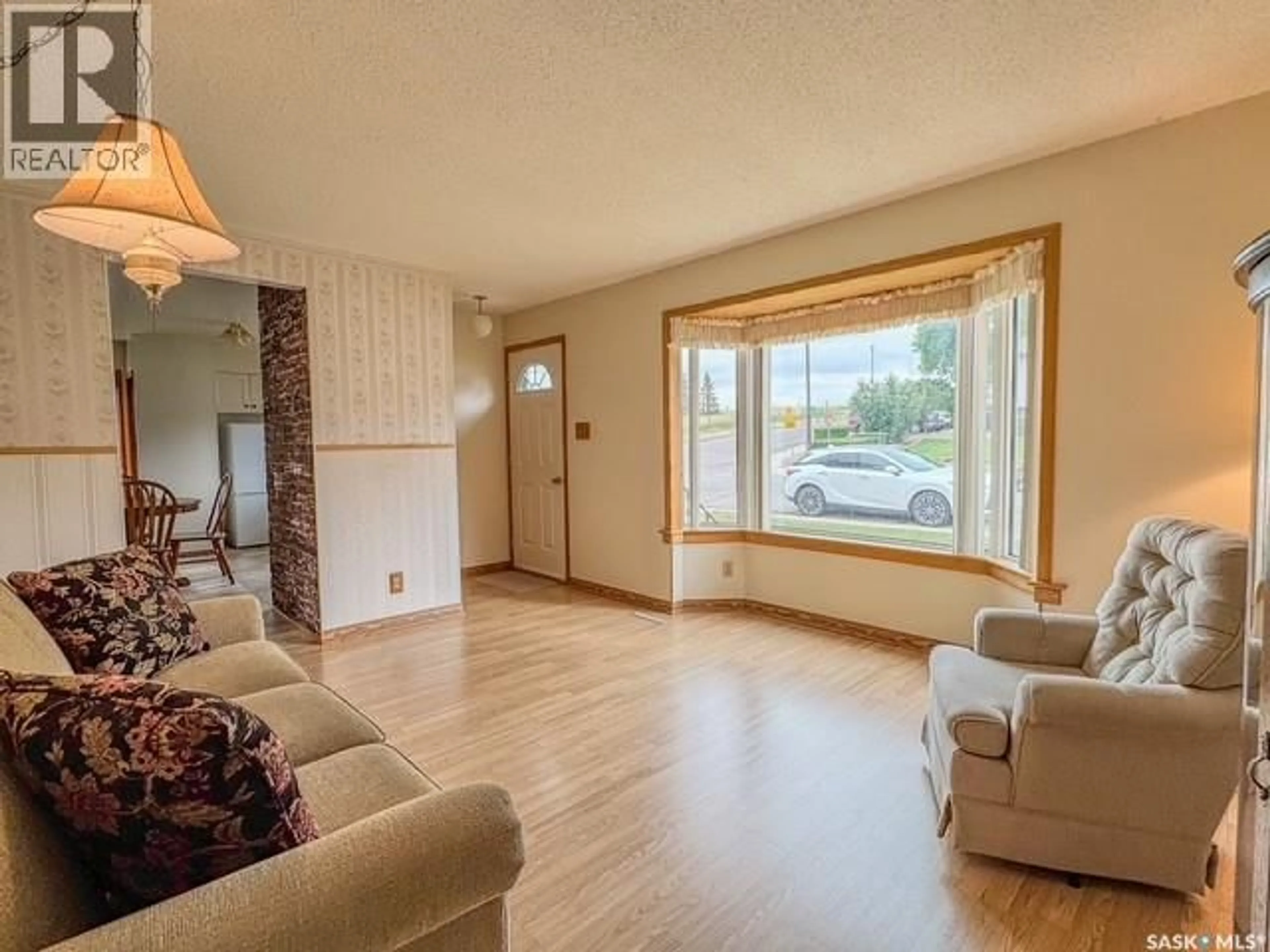 Living room with furniture, unknown for 385 ASPEN DRIVE, Swift Current Saskatchewan S9H3Z8