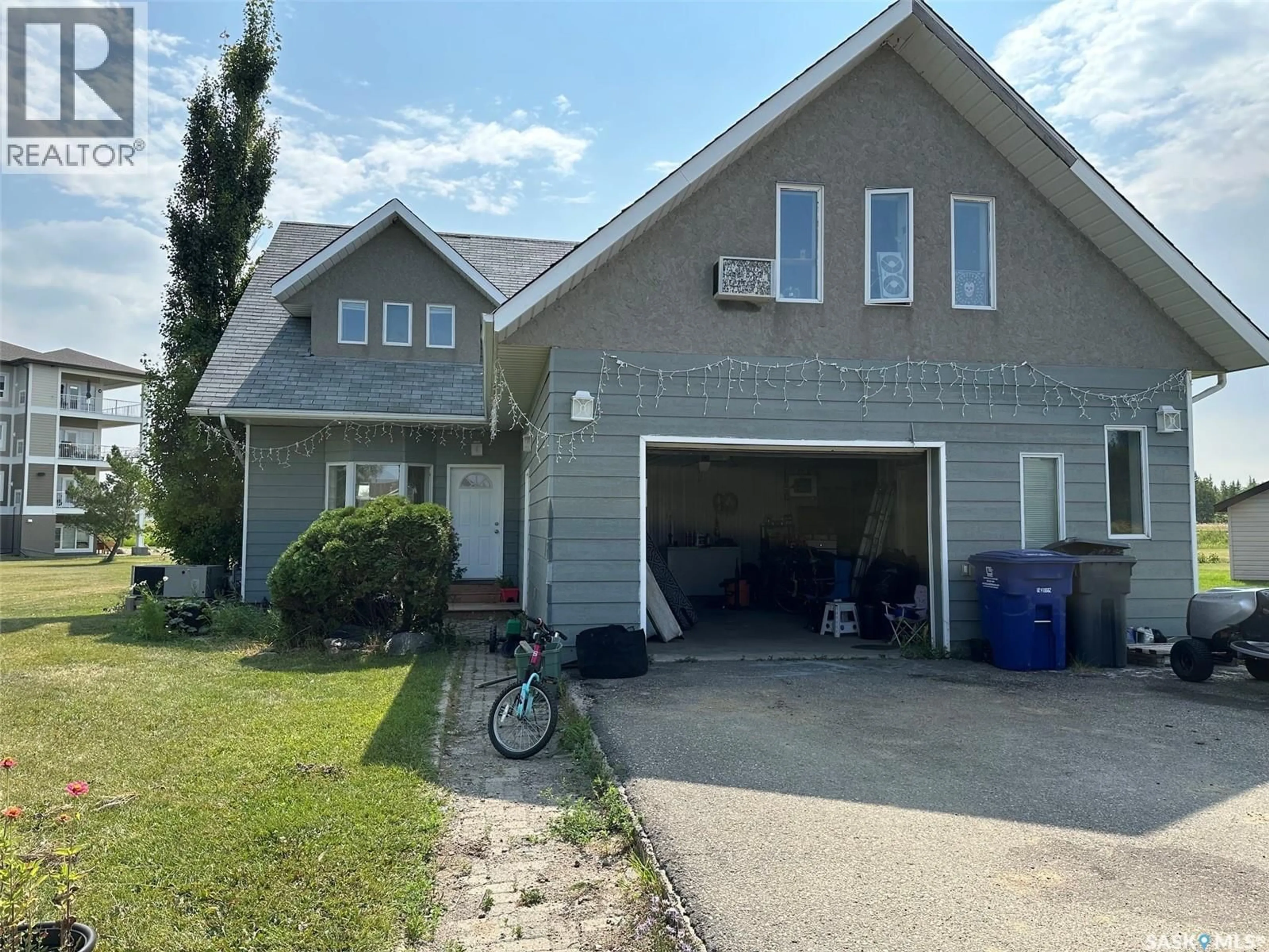 Home with vinyl exterior material, street for 108 LUNDY PLACE, Stoughton Saskatchewan S0G4T0