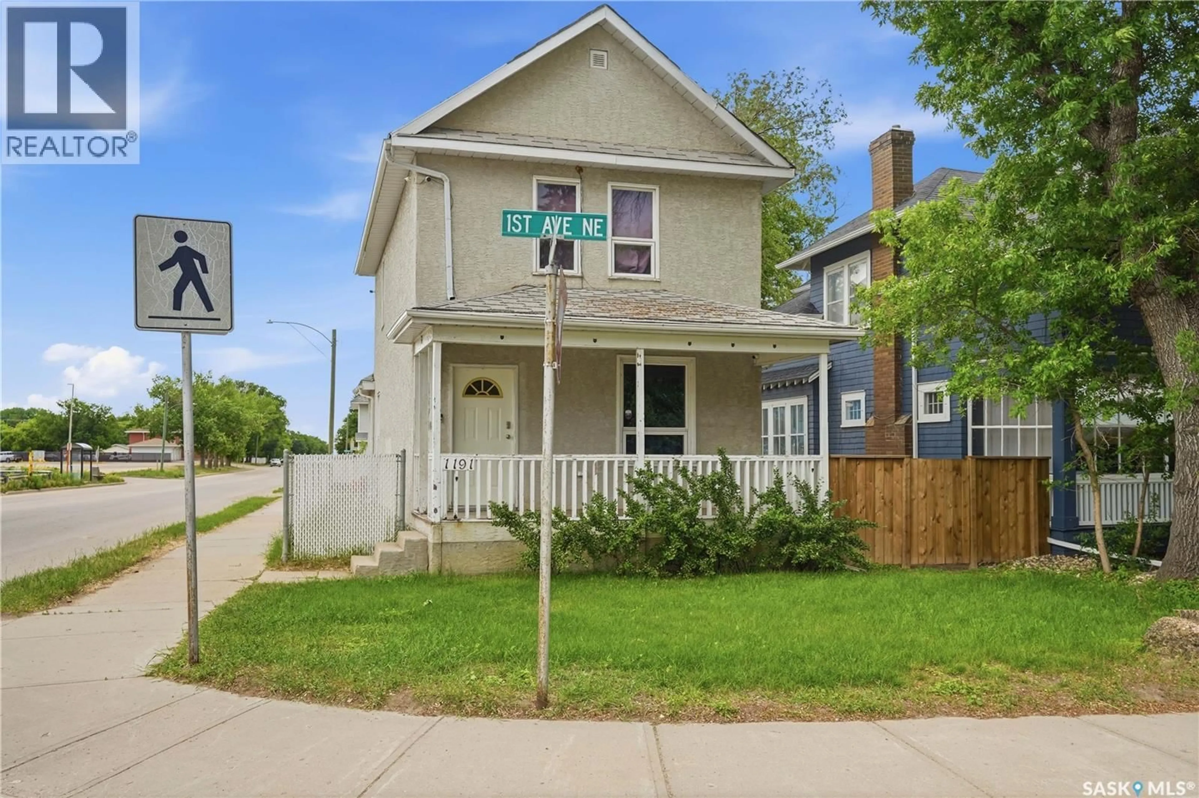 Home with vinyl exterior material, street for 1191 1ST AVENUE, Moose Jaw Saskatchewan S6H1A2