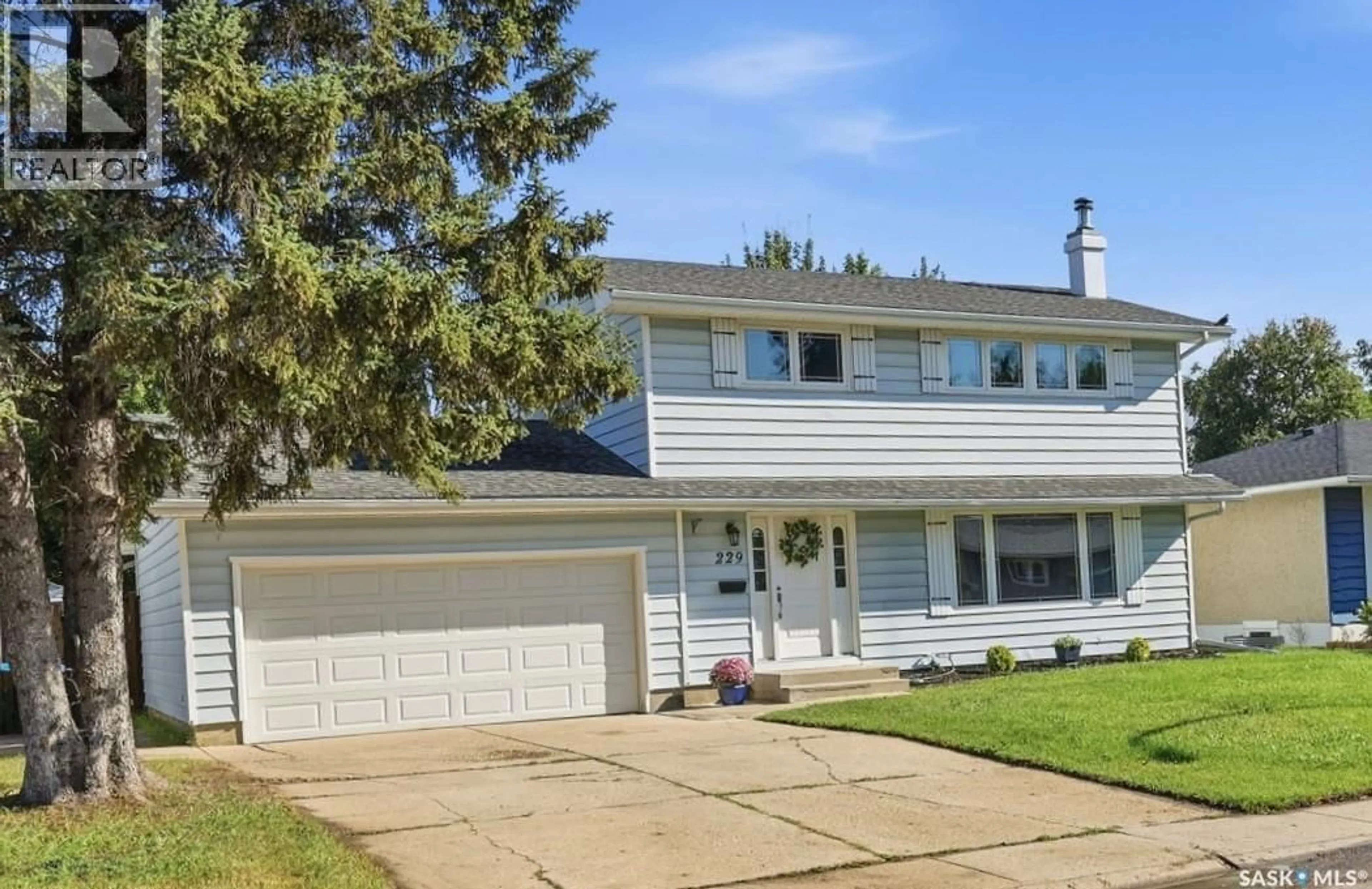 Home with vinyl exterior material, street for 229 ANDERSON CRESCENT, Saskatoon Saskatchewan S7H4A1