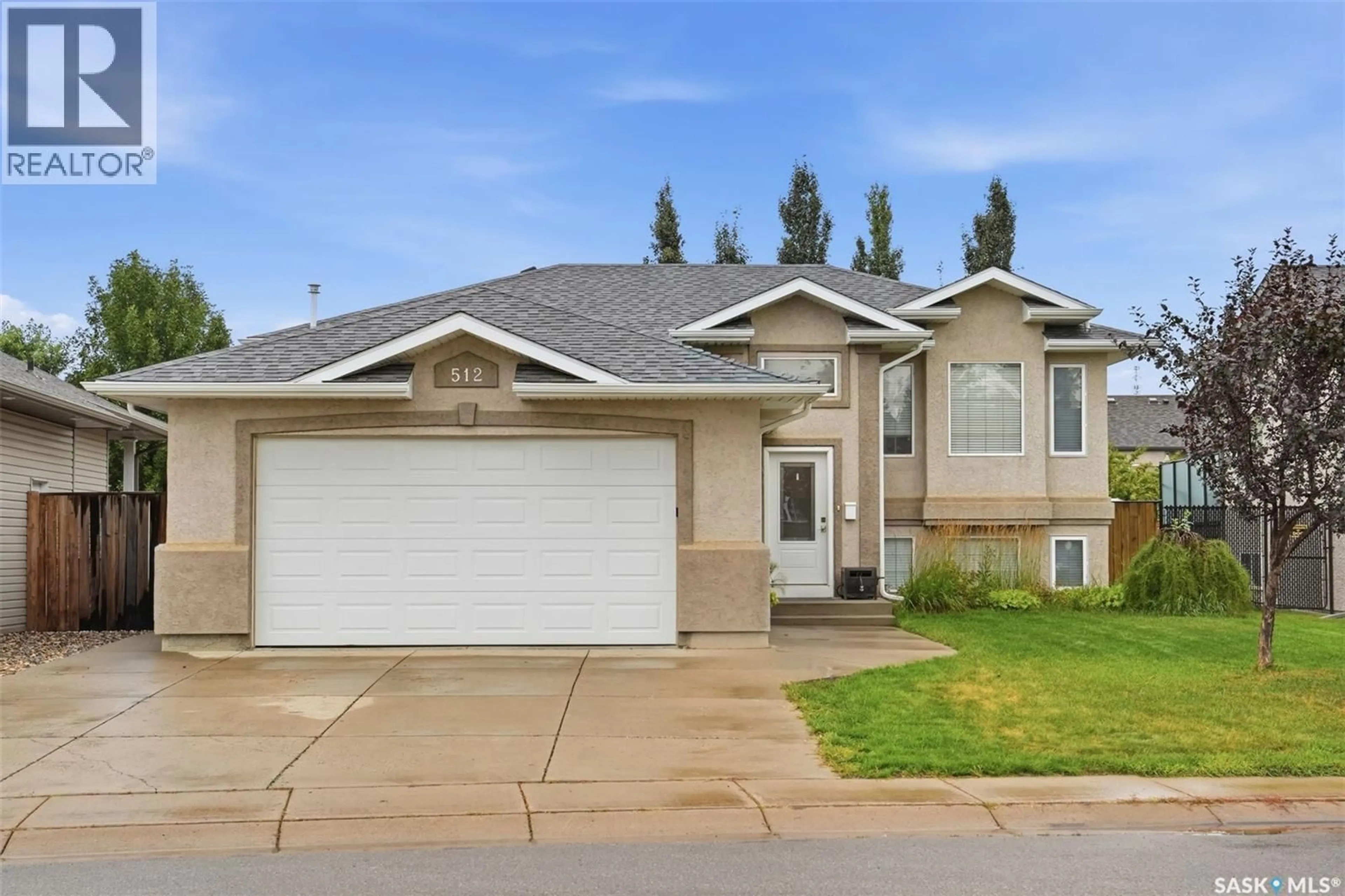 Home with vinyl exterior material, street for 512 ENS LANE, Warman Saskatchewan S0K4S0