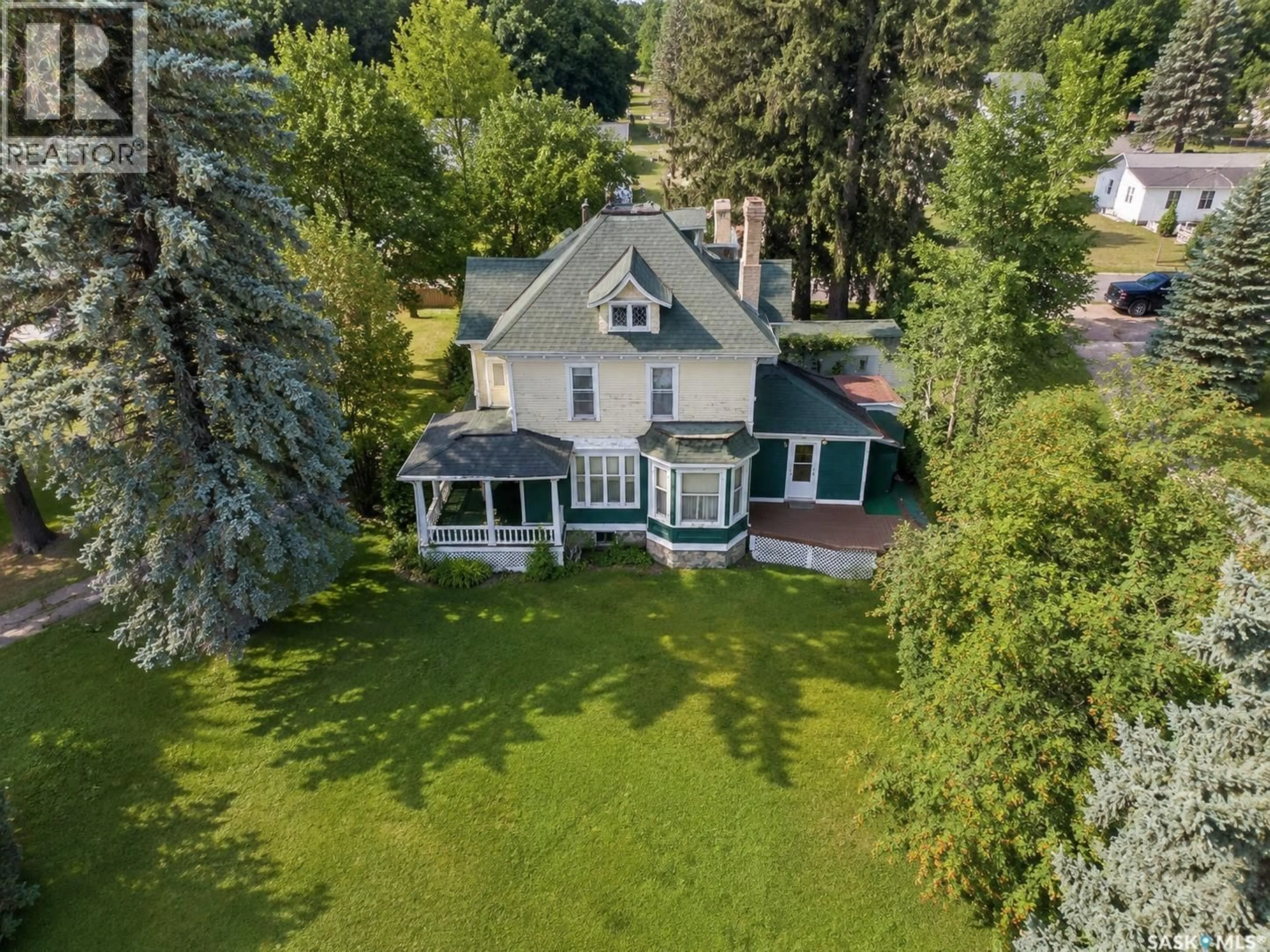A pic from outside/outdoor area/front of a property/back of a property/a pic from drone, water/lake/river/ocean view for 903 BOYLE STREET, Indian Head Saskatchewan S0G2K0