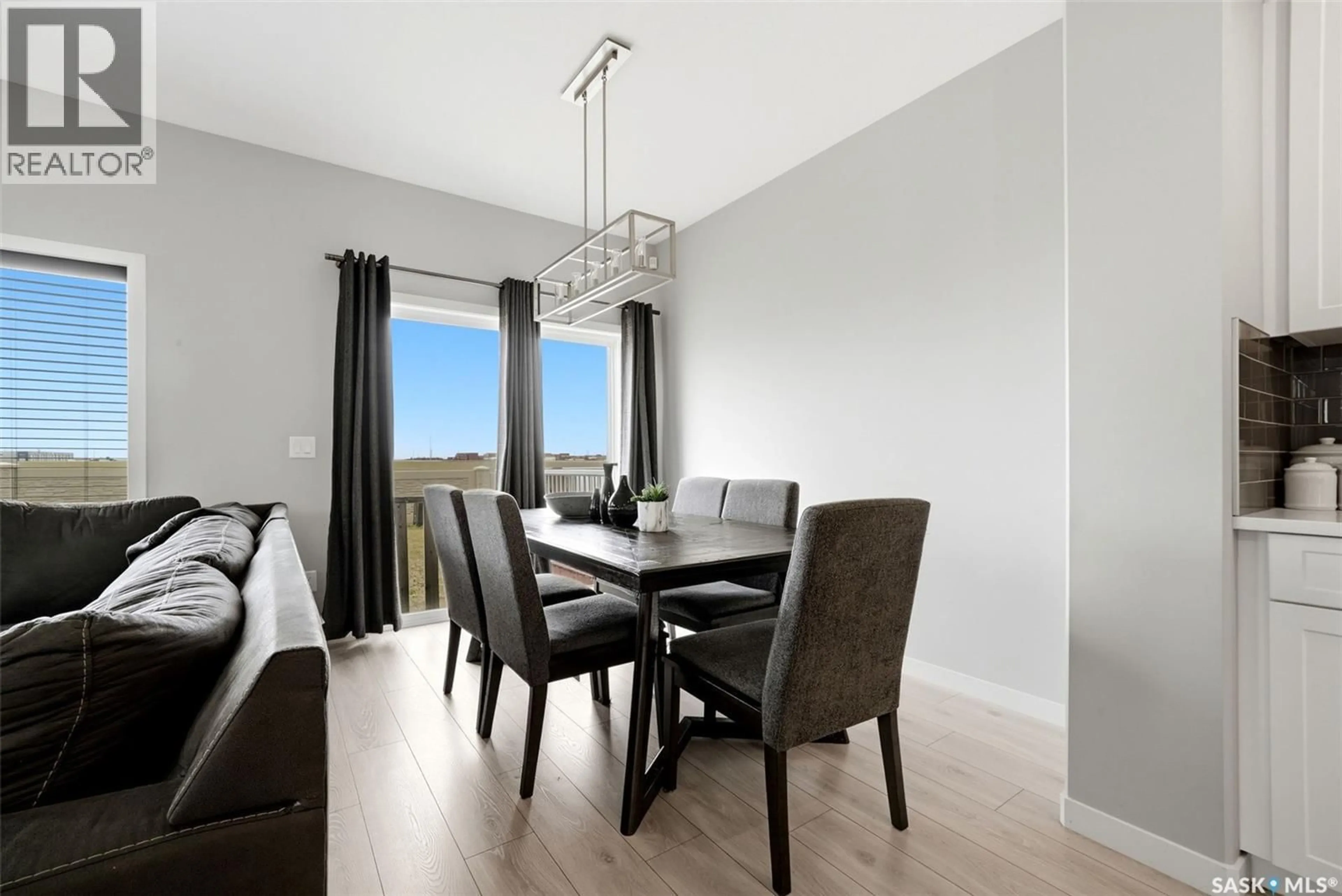 Dining room, wood/laminate floor for 3886 GEE CRESCENT, Regina Saskatchewan S4V3N9